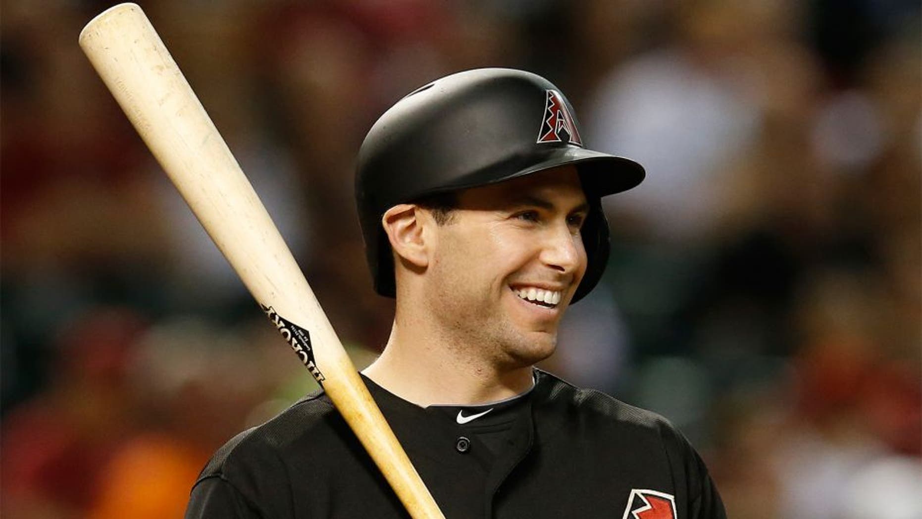 FILE - In this June 6, 2015, file photo, Arizona Diamondbacks Paul Goldschmidt reacts while being intentionally walked in the eighth inning of a baseball game against the New York Mets in Phoenix. Goldschmidt is having a season as good as anyone in the majors. Yet the attention he receives nationally is far less thant the other so-called big names in the game. His response? "I couldn't care less." (AP Photo/Rick Scuteri, File)