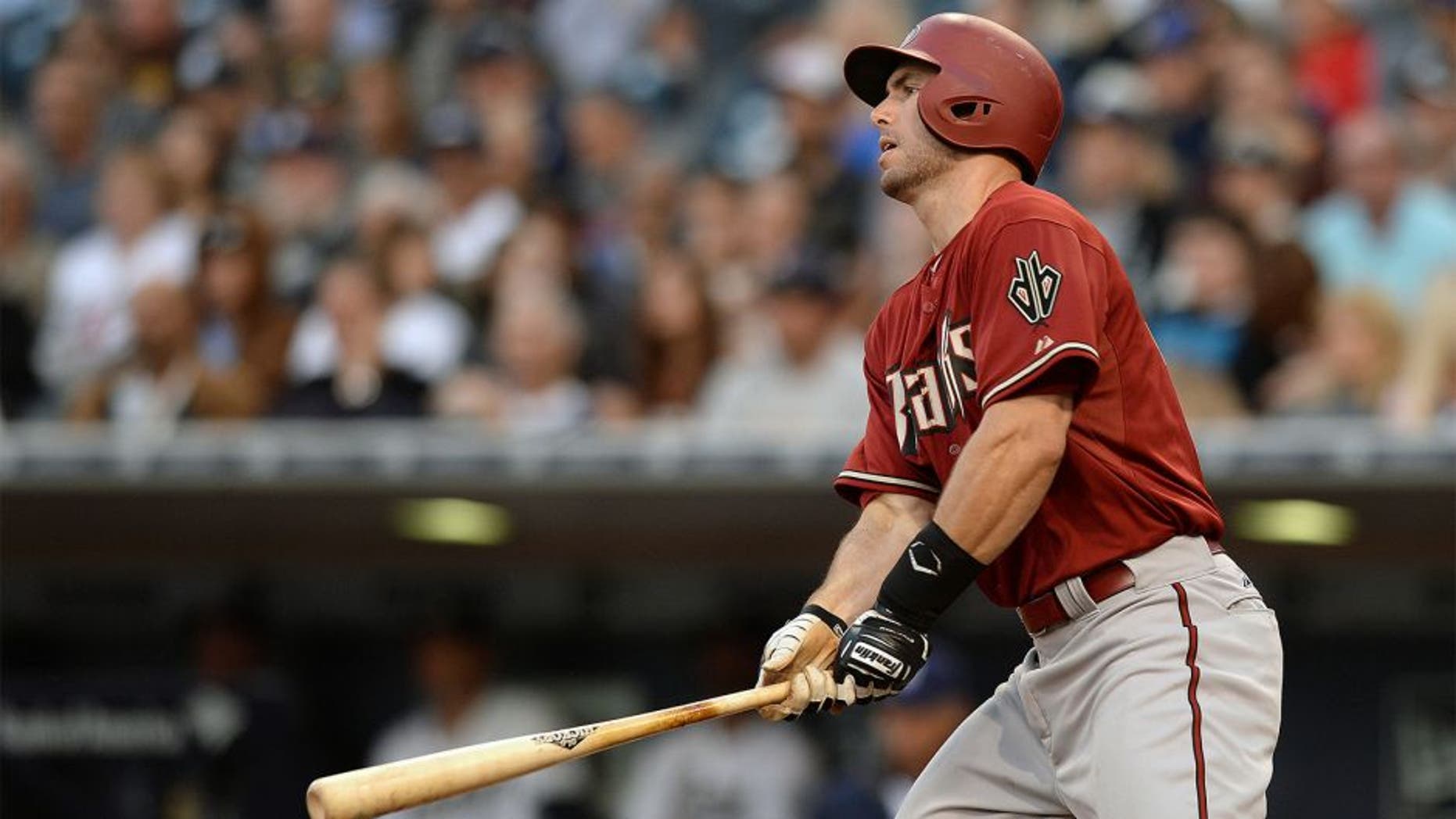 Apr 15, 2015; San Diego, CA, USA; Arizona Diamondbacks first baseman Paul Goldschmidt singles during the third inning against the San Diego Padres at Petco Park. Mandatory Credit: Jake Roth-USA TODAY Sports