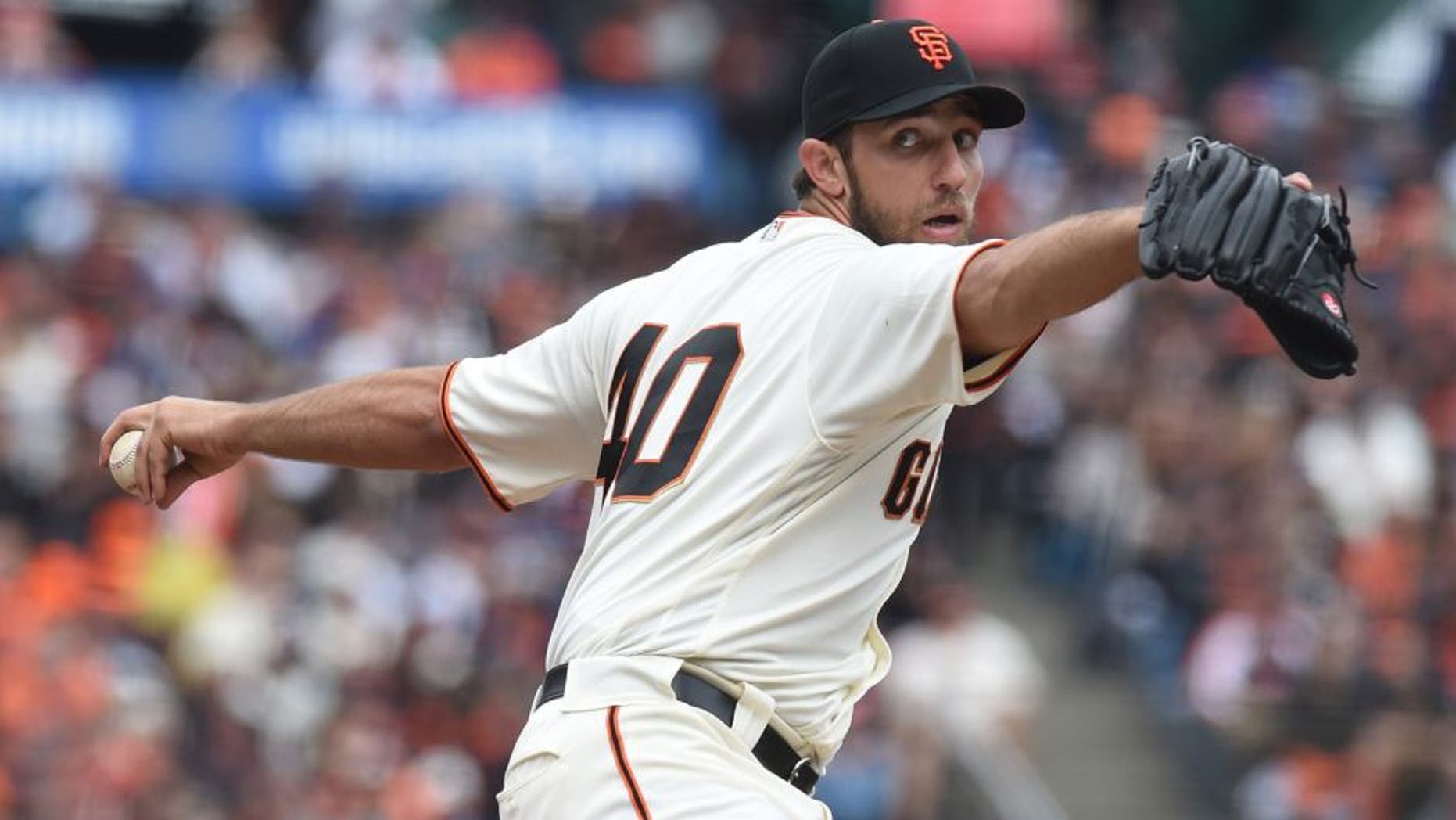Apr 9, 2016; San Francisco, CA, USA; San Francisco Giants starting pitcher Madison Bumgarner (40) throws a pitch during the first inning against the Los Angeles Dodgers at AT&T Park. Mandatory Credit: Kenny Karst-USA TODAY Sports