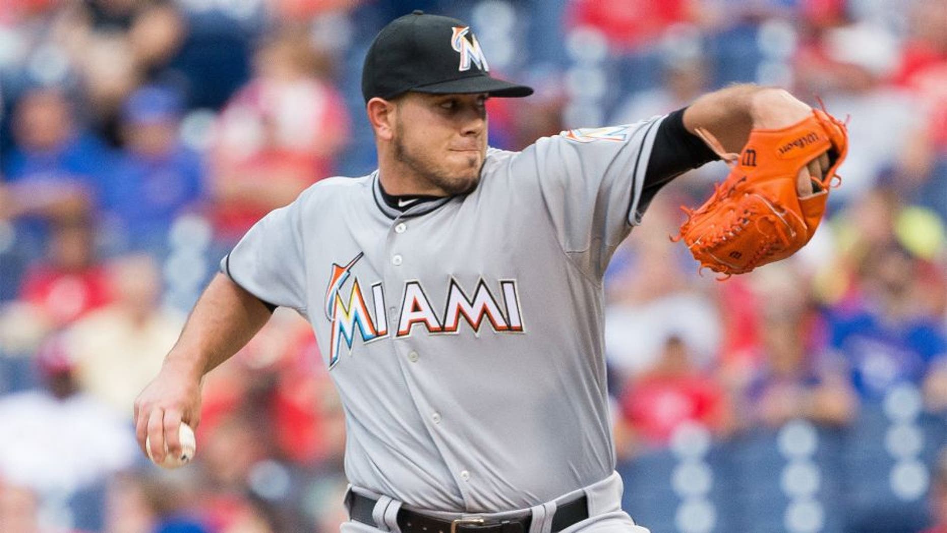 Jul 17, 2015; Philadelphia, PA, USA; Miami Marlins starting pitcher Jose Fernandez (16) pitches against the Philadelphia Phillies during the first inning at Citizens Bank Park. Mandatory Credit: Bill Streicher-USA TODAY Sports