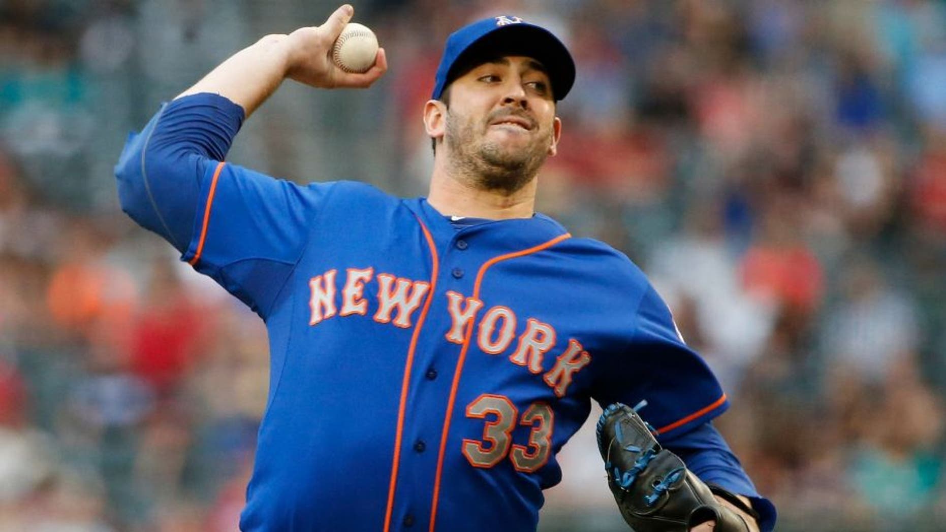 New York Mets' Matt Harvey throws a pitch against the Arizona Diamondbacks during the first inning of a baseball game Thursday, June 4, 2015, in Phoenix. (AP Photo/Ross D. Franklin)