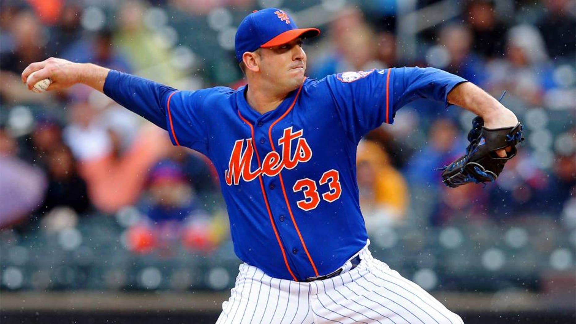 Jun 27, 2015; New York City, NY, USA; New York Mets starting pitcher Matt Harvey (33) pitches against the Cincinnati Reds during the second inning at Citi Field. Mandatory Credit: Brad Penner-USA TODAY Sports