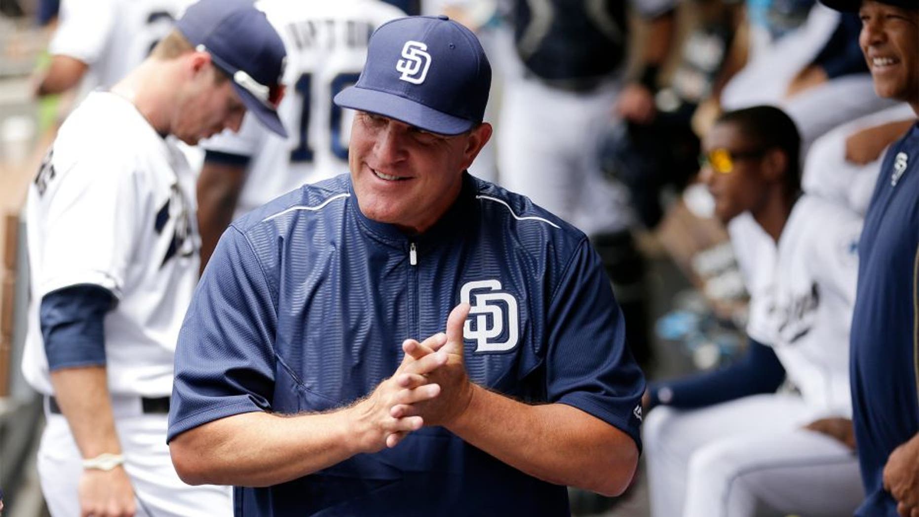 San Diego Padres interim manager Pat Murphy looks on from the dugout before the Padres play the Oakland Athletics in a baseball game Tuesday, June 16, 2015, in San Diego. (AP Photo/Gregory Bull)
