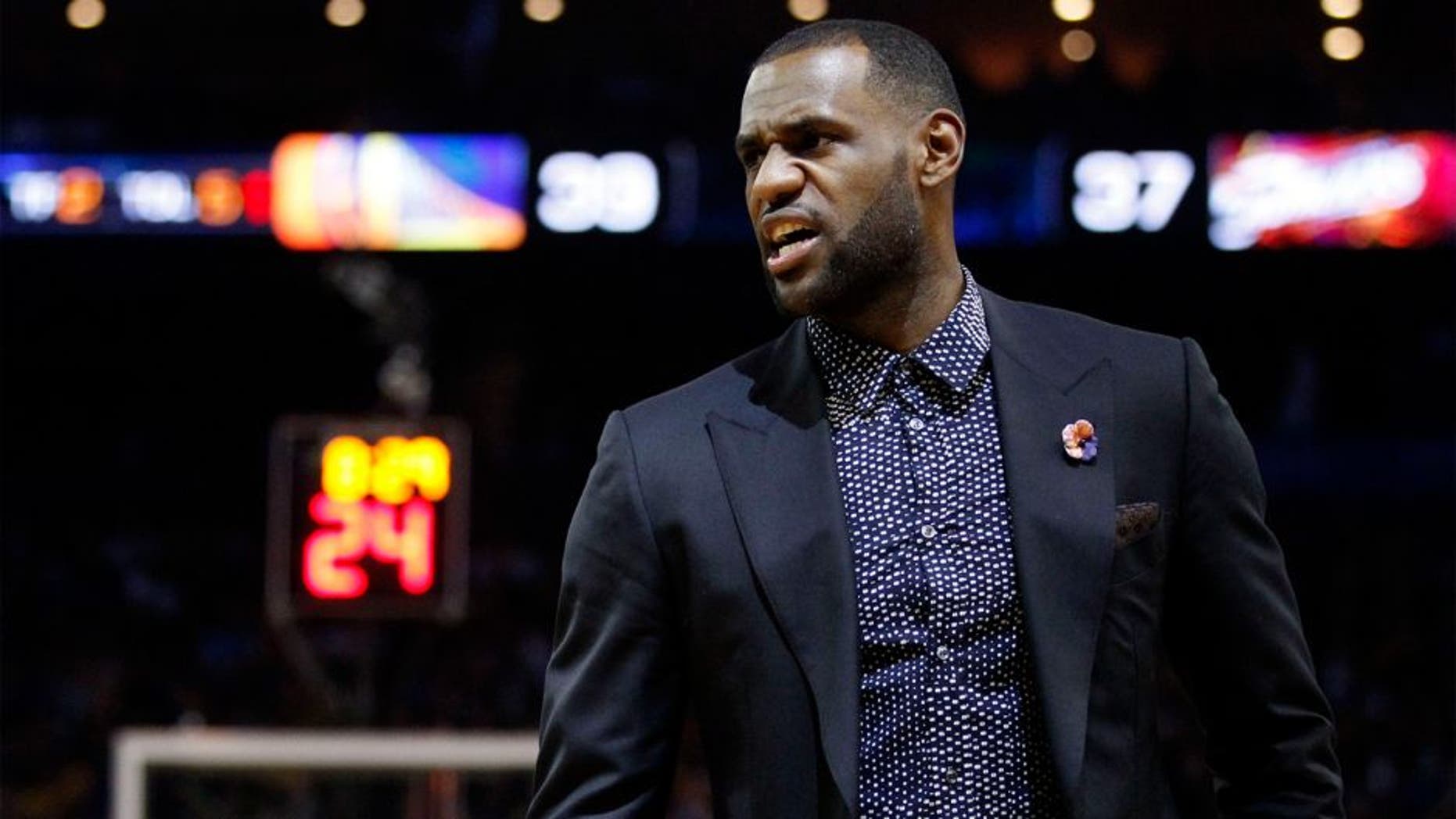 Jan 9, 2015; Oakland, CA, USA; Cleveland Cavaliers forward LeBron James (23) stands on the court during a timeout against the Golden State Warriors in the second quarter at Oracle Arena. Mandatory Credit: Cary Edmondson-USA TODAY Sports