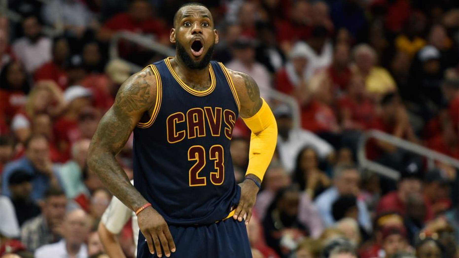 May 20, 2015; Atlanta, GA, USA; Cleveland Cavaliers forward LeBron James (23) reacts during the third quarter of game one of the Eastern Conference Finals of the NBA Playoffs against the Atlanta Hawks at Philips Arena. Mandatory Credit: Dale Zanine-USA TODAY Sports