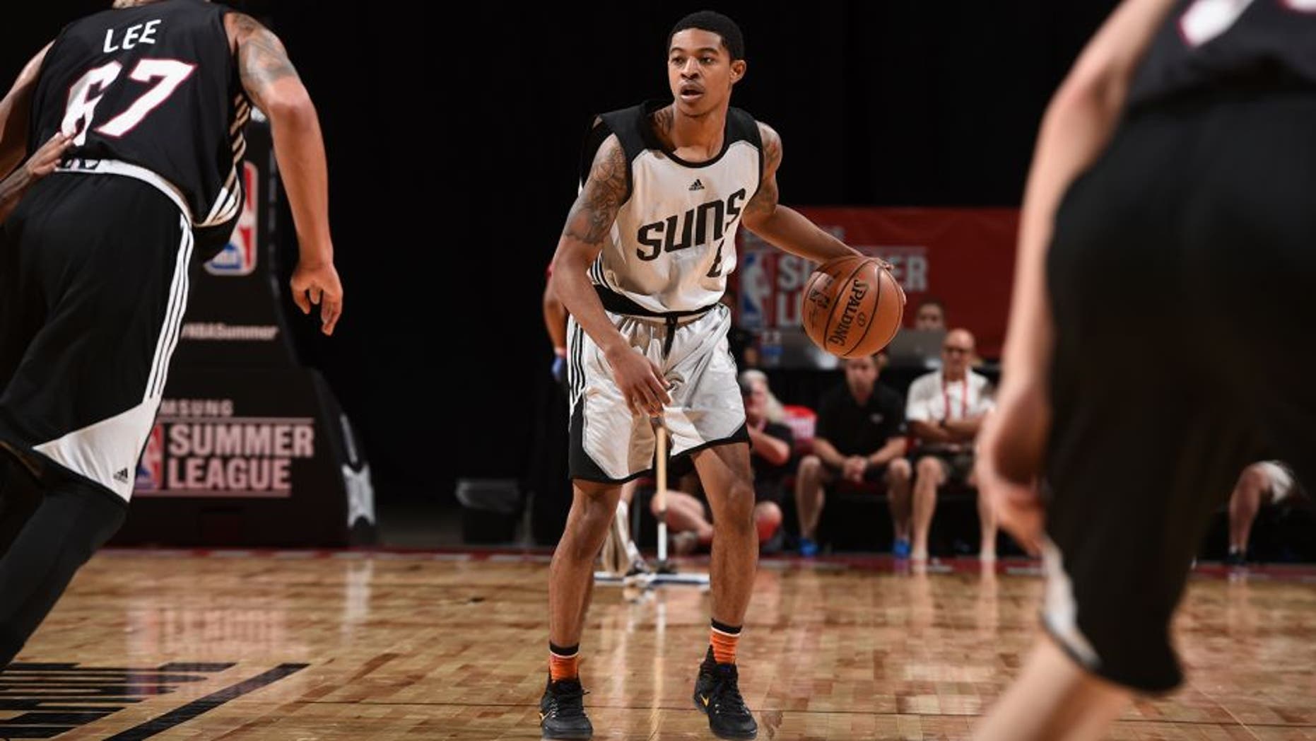 LAS VEGAS, NV - JULY 12: Tyler Ulis #8 of the Phoenix Suns handles the ball against the Miami Heat during the 2016 NBA Las Vegas Summer League on July 12, 2016 at The Thomas & Mack Center in Las Vegas, Nevada. NOTE TO USER: User expressly acknowledges and agrees that, by downloading and or using this photograph, user is consenting to the terms and conditions of Getty Images License Agreement. Mandatory Copyright Notice: Copyright 2016 NBAE (Photo by Garrett Ellwood/NBAE via Getty Images)