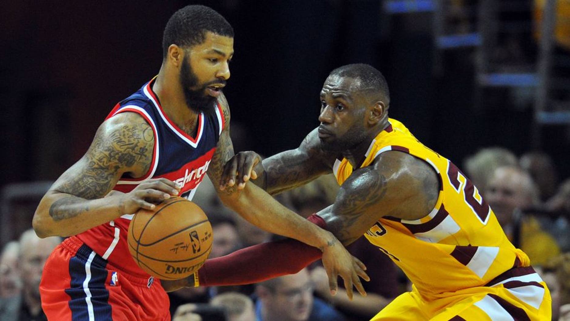 Mar 4, 2016; Cleveland, OH, USA; Cleveland Cavaliers forward LeBron James (23) defends Washington Wizards forward Markieff Morris (5) during the third quarter at Quicken Loans Arena. The Cavs won 108-83. Mandatory Credit: Ken Blaze-USA TODAY Sports