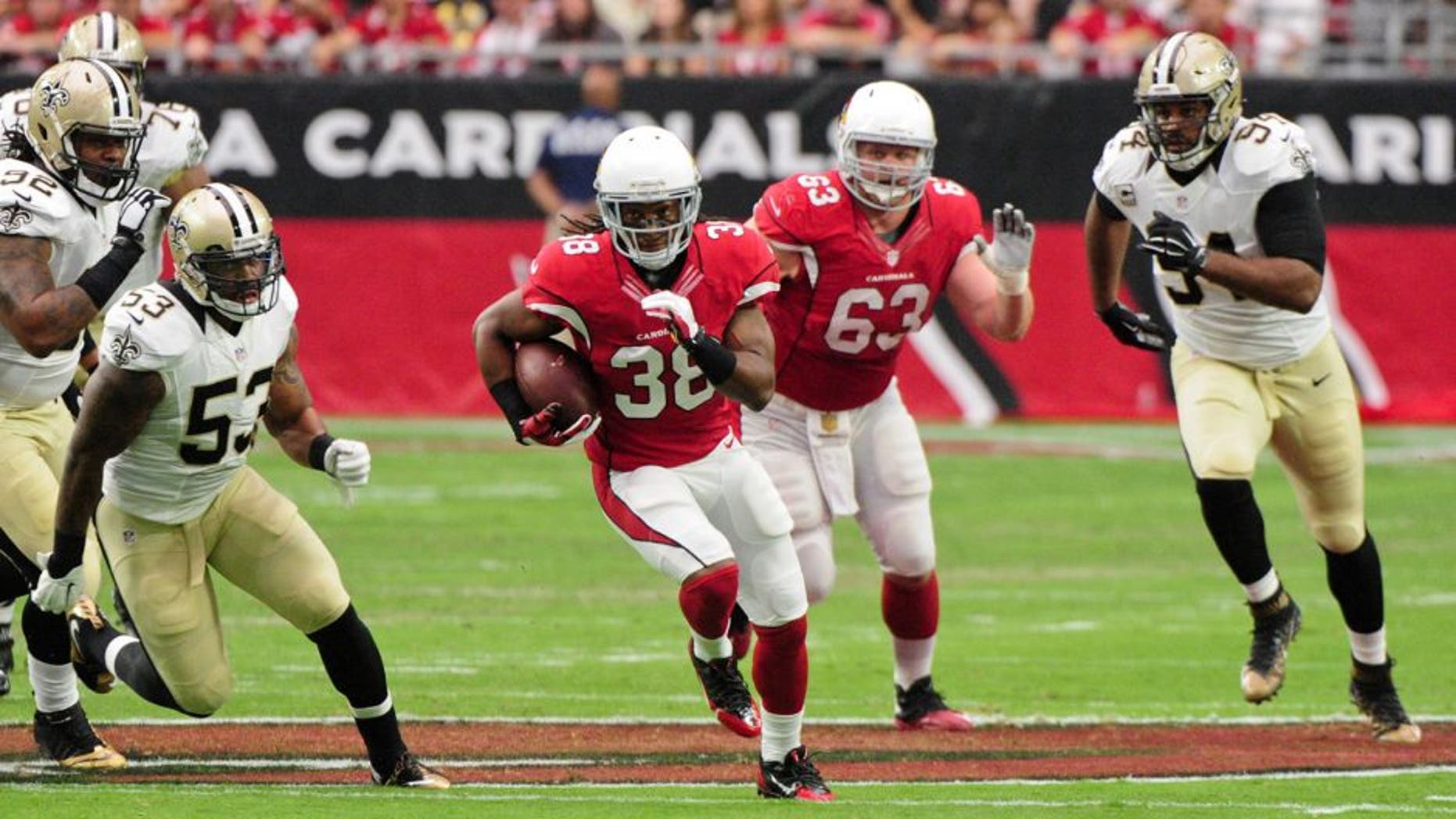 Sep 13, 2015; Glendale, AZ, USA; Arizona Cardinals running back Andre Ellington (38) carries the ball during the first half against the Arizona Cardinals at University of Phoenix Stadium. Mandatory Credit: Matt Kartozian-USA TODAY Sports