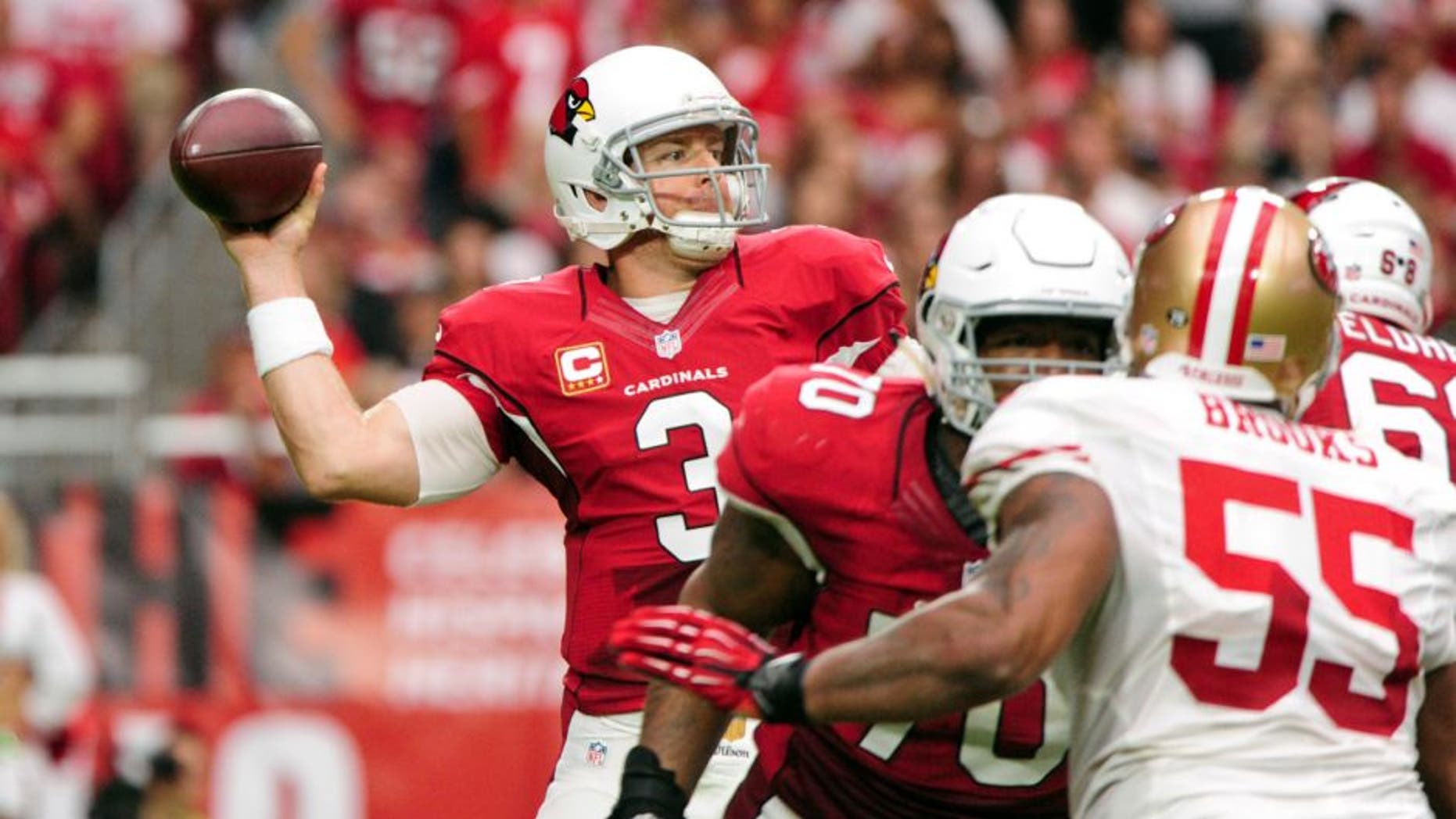 Sep 27, 2015; Glendale, AZ, USA; Arizona Cardinals quarterback Carson Palmer (3) throws during the first half against the San Francisco 49ers at University of Phoenix Stadium. Mandatory Credit: Matt Kartozian-USA TODAY Sports