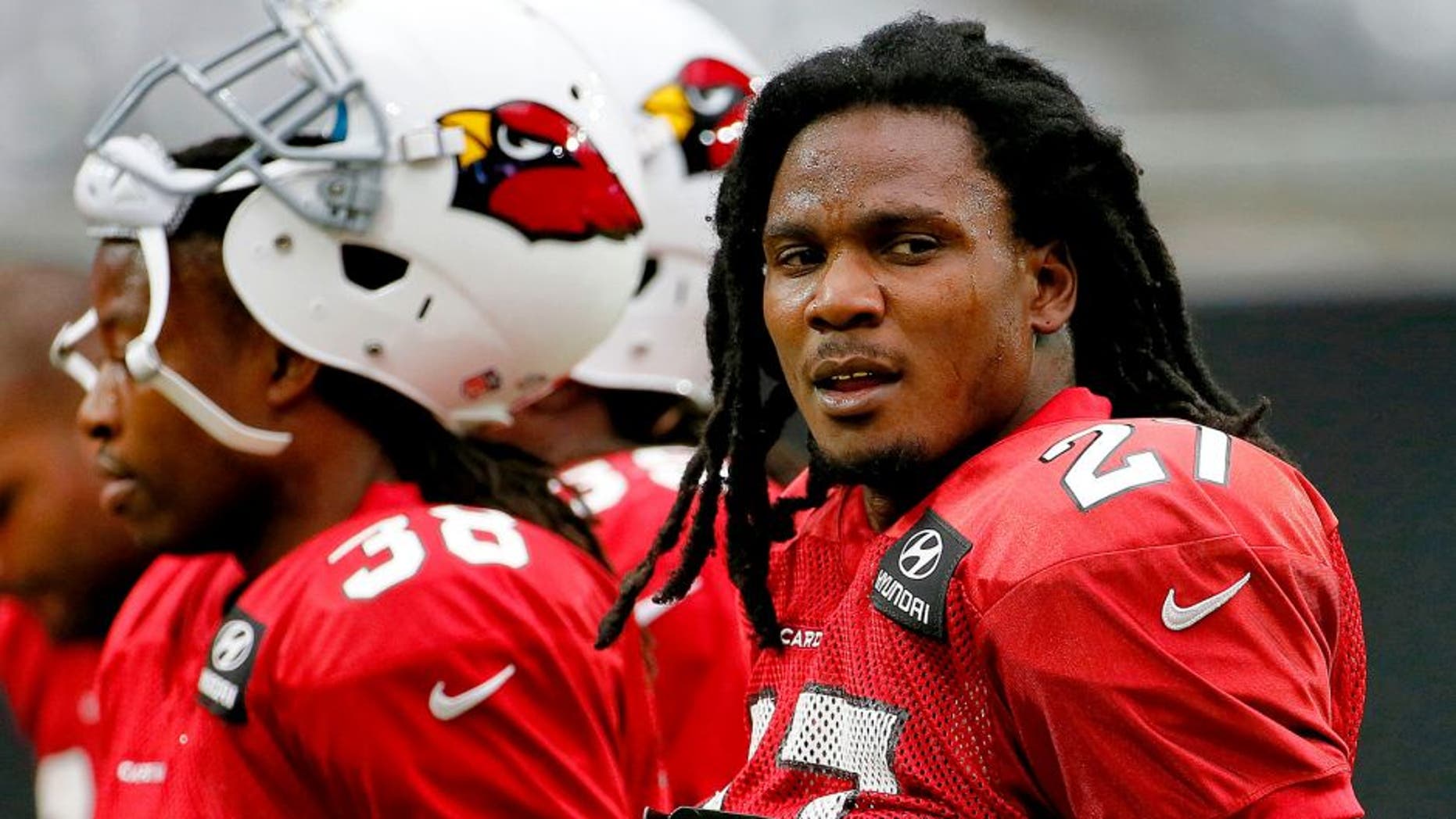 Arizona Cardinals running back Chris Johnson participates in an NFL football training camp, Tuesday, Aug. 18, 2015, in Glendale, Ariz. (AP Photo/Matt York)