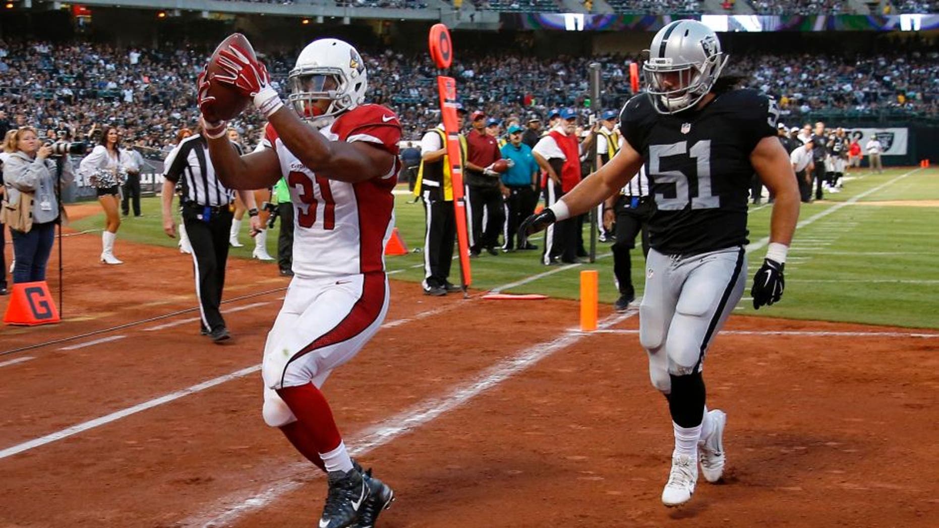 Cardinals Raiders Football