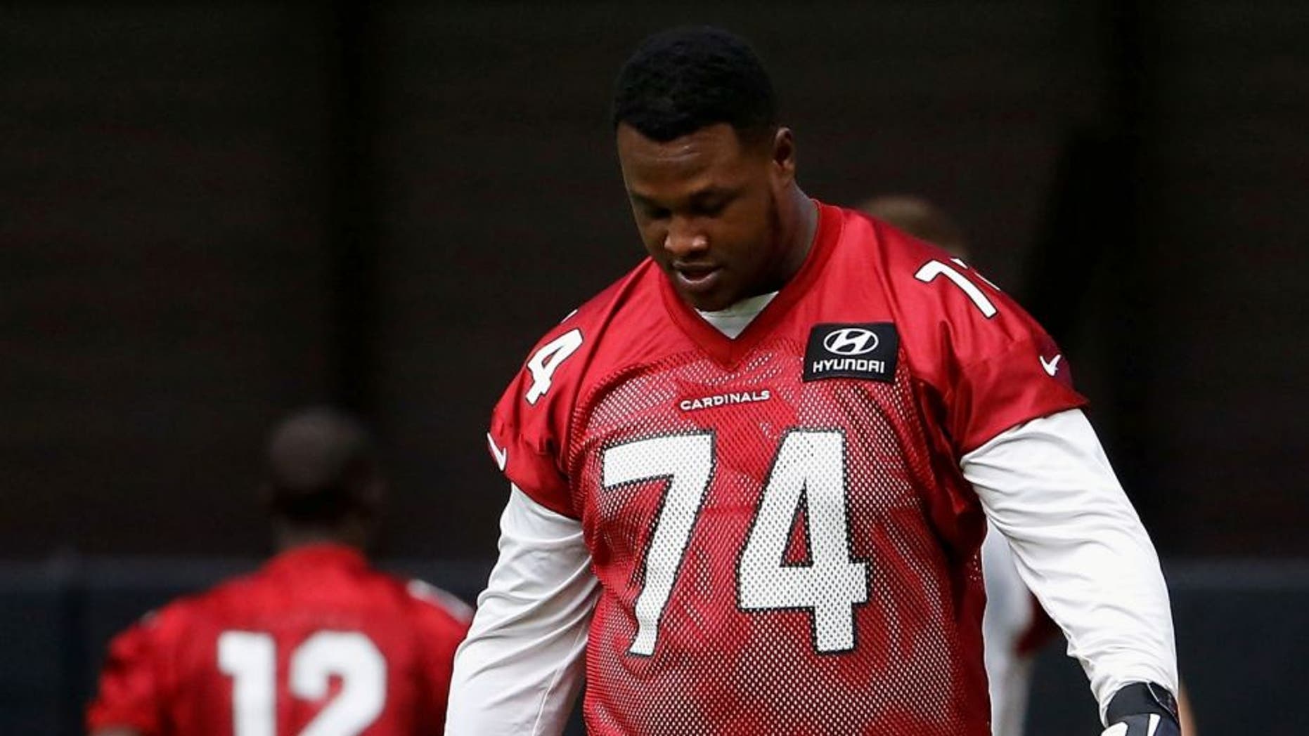 during the team training camp at University of Phoenix Stadium on August 1, 2015 in Glendale, Arizona.