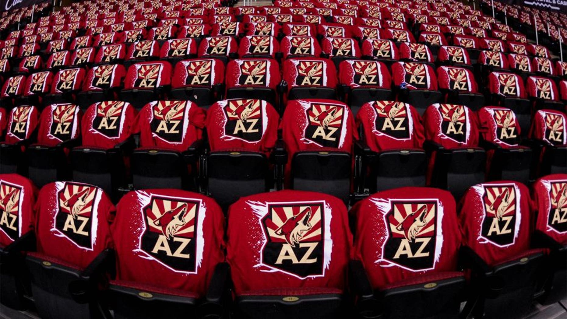 Oct 9, 2014; Glendale, AZ, USA; Tshirts on seats await fans prior to the game between the Arizona Coyotes and the Winnipeg Jets at Gila River Arena. Mandatory Credit: Matt Kartozian-USA TODAY Sports