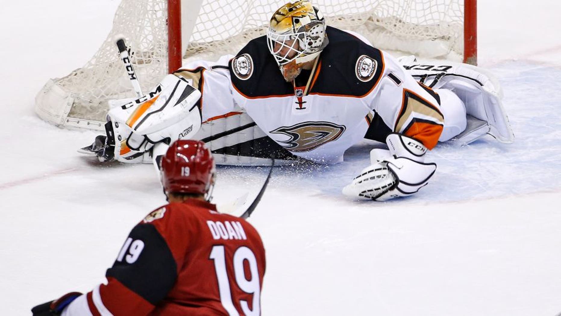 Arizona Coyotes' Shane Doan (19) scores the game-winning goal against Anaheim Ducks goalie Jonathan Bernier (1) during overtime of a preseason NHL hockey game Saturday, Oct. 1, 2016, in Glendale, Ariz. The Coyotes defeated the Ducks 3-2. (AP Photo/Ross D. Franklin)