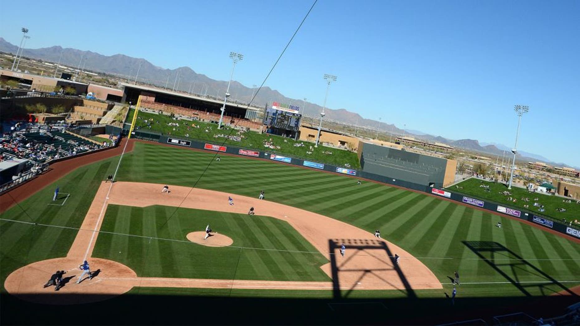 Feb 25, 2013; Salt River Pima-Maricopa, AZ, USA; A general view of a game between the Texas Rangers and Colorado Rockies in the ninth inning at Salt River Fields at Talking Stick. Mandatory Credit: Jake Roth-USA TODAY Sports