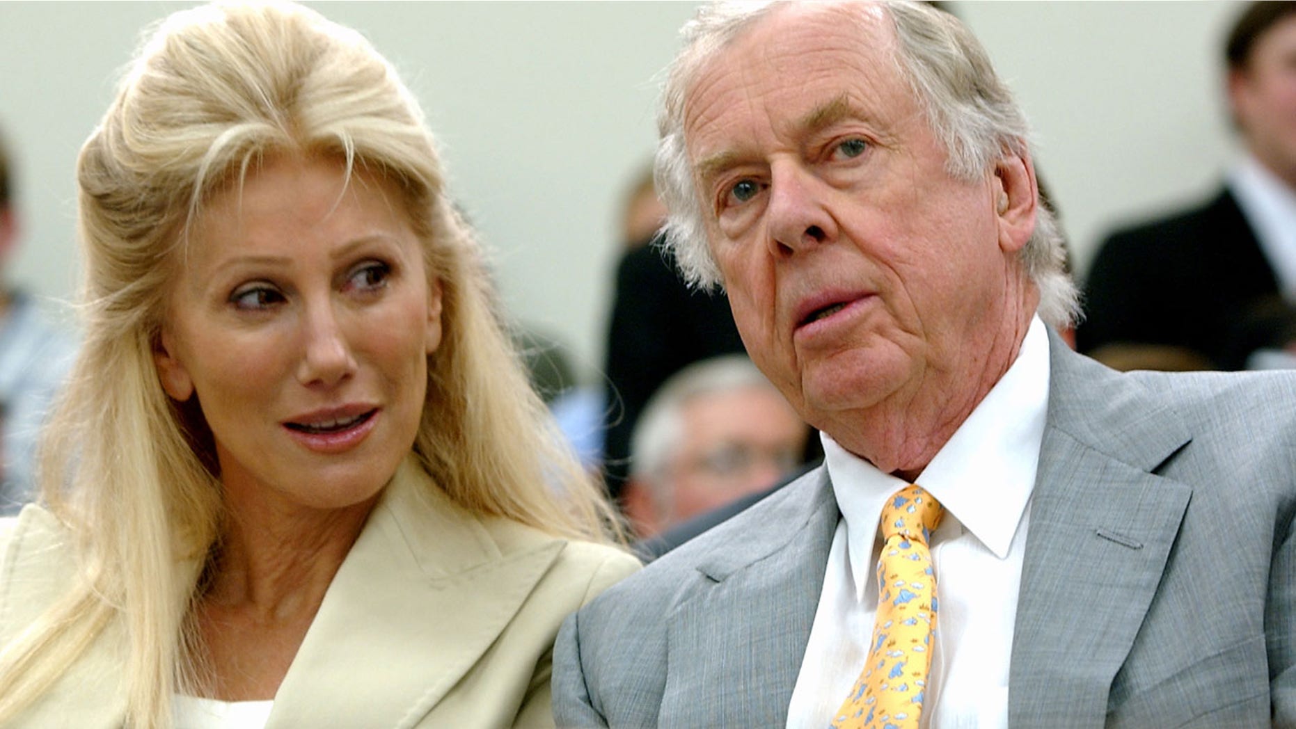 July 25, 2006: Oklahoma energy tycoon T. Boone Pickens, right, with his wife, Madeleine, appear at a House Energy and Commerce subcommittee hearing on Capitol Hill in Washington.