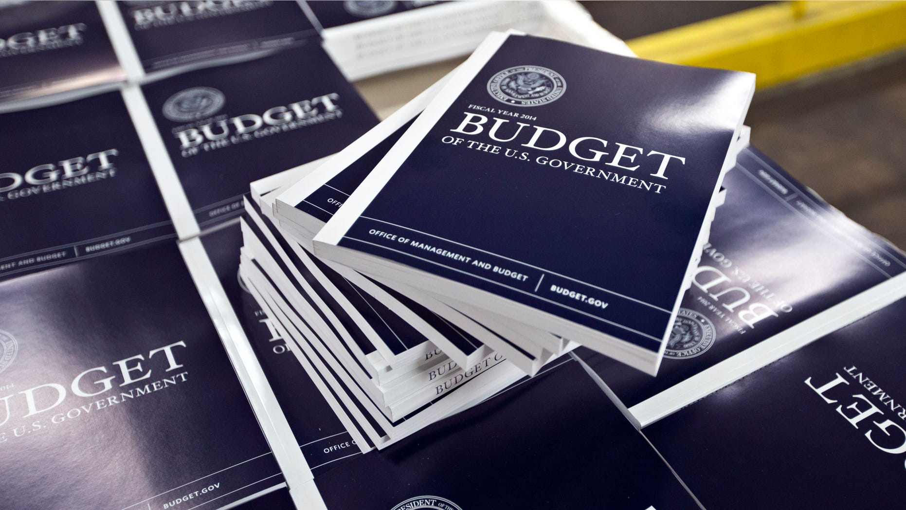 April 8, 2013: Copies of President Obama's budget plan for fiscal year 2014 are prepared for delivery at the U.S. Government Printing Office in Washington.