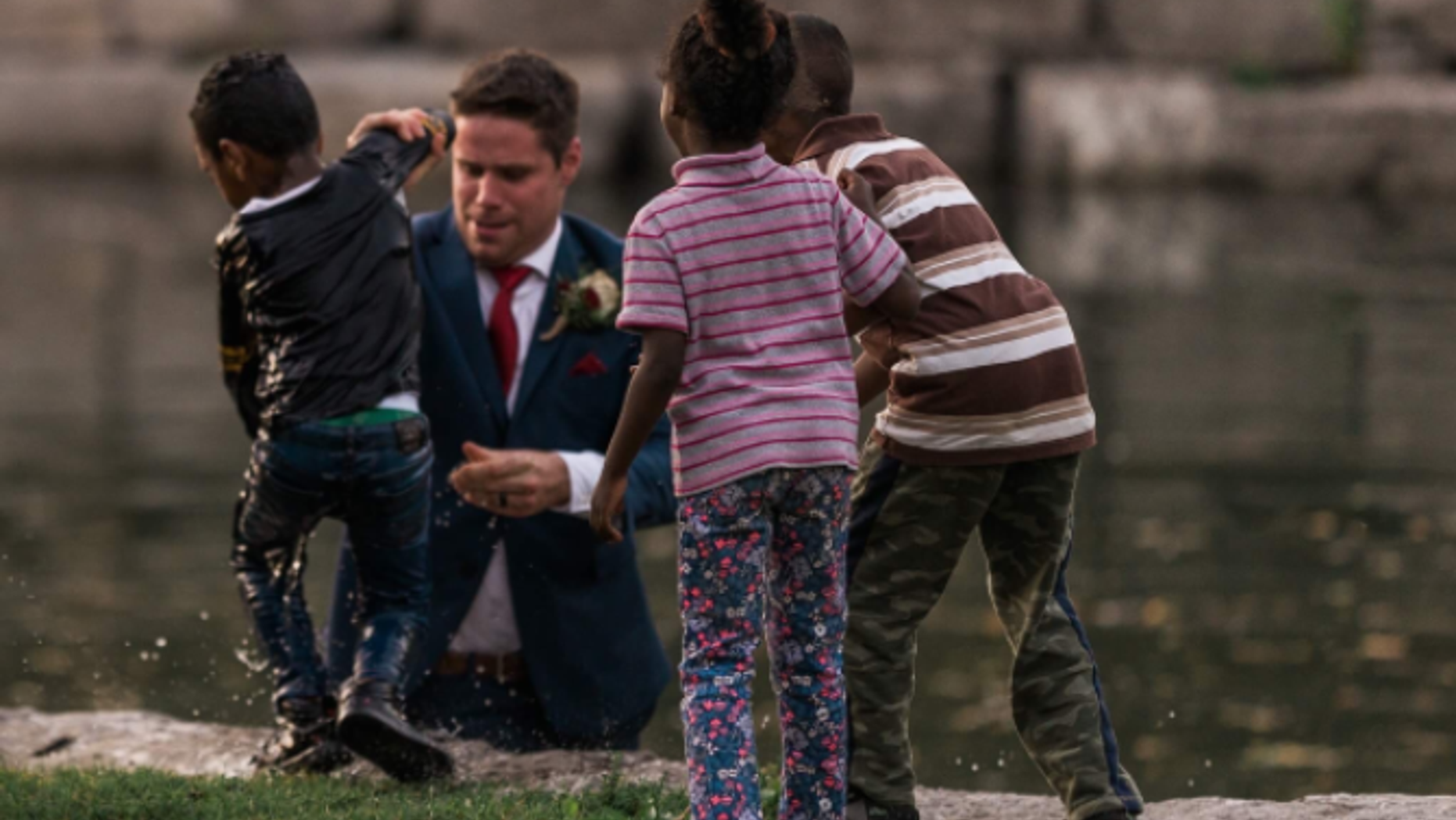 Canadian groom Clayton Cook stopped posing for wedding photos to save a young boy drowning in a pond Friday.