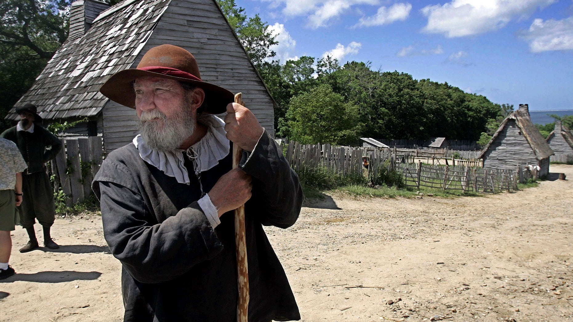 FILE - This June 27, 2006, file photo, shows a 17th century costumed role player, who called himself Samuel Fuller, in a 1627 Pilgrim Village at Plimoth Plantation in Plymouth, Mass. Leading scholars from around the globe are teaming up to shed more light on how America got its start. Prominent museums and historical societies from the U.S. and Europe that specialize in the 17th century have formed New England Beginnings. The group said its also trying to dispel myths about how the settlers interacted with Native Americans. (AP Photo/Chitose Suzuki, File)