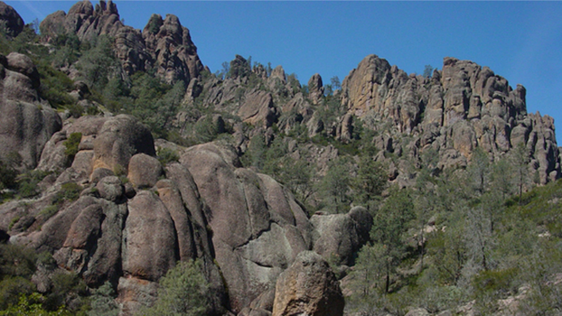 Rounded knobs and pinnacles rise above Condor Gulch in Pinnacles National Monument. Weathering of volcanic rock gives rise to the park's unique landscape.