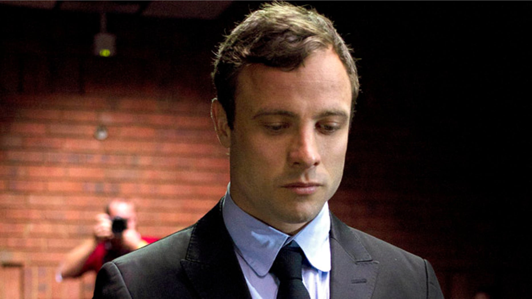 Aug. 19, 2013 Double-amputee Olympian Oscar Pistorius appears at the magistrates court to be indicted on charges of murder and illegal possession of ammunition for the shooting death of his girlfriend on Valentine's Day in Pretoria, South Africa.