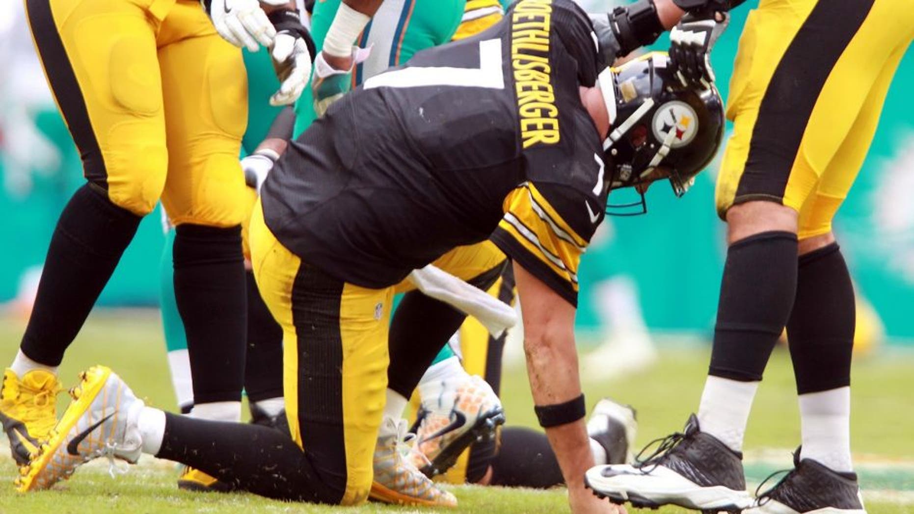 The Miami Dolphins defense shakes up Pittsburgh Steelers quarterback Ben Roethlisberger in the fourth quarter on Sunday, Oct. 16, 2016 at Hard Rock Stadium in Miami Gardens, Fla. (Charles Trainor Jr./Miami Herald/TNS via Getty Images)
