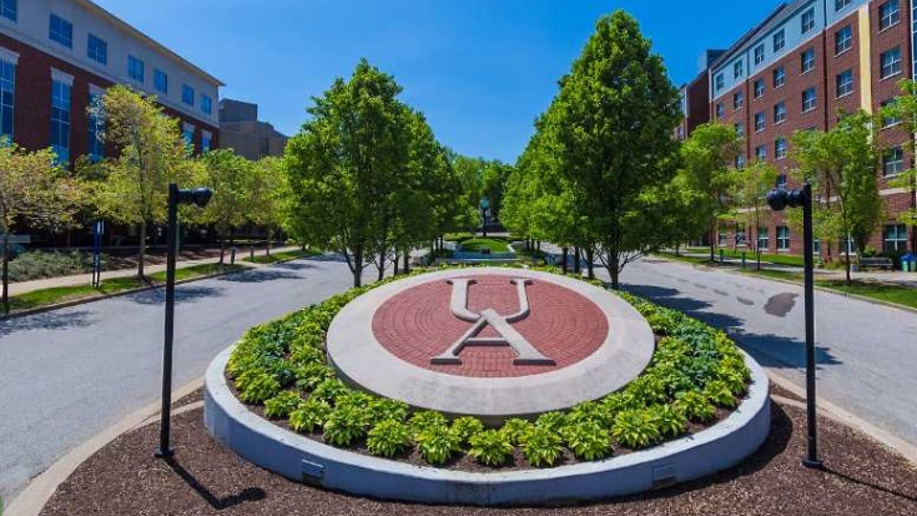A college professor has been rebuked by his school after seeming to promise to raise some students' grades on account of their gender.