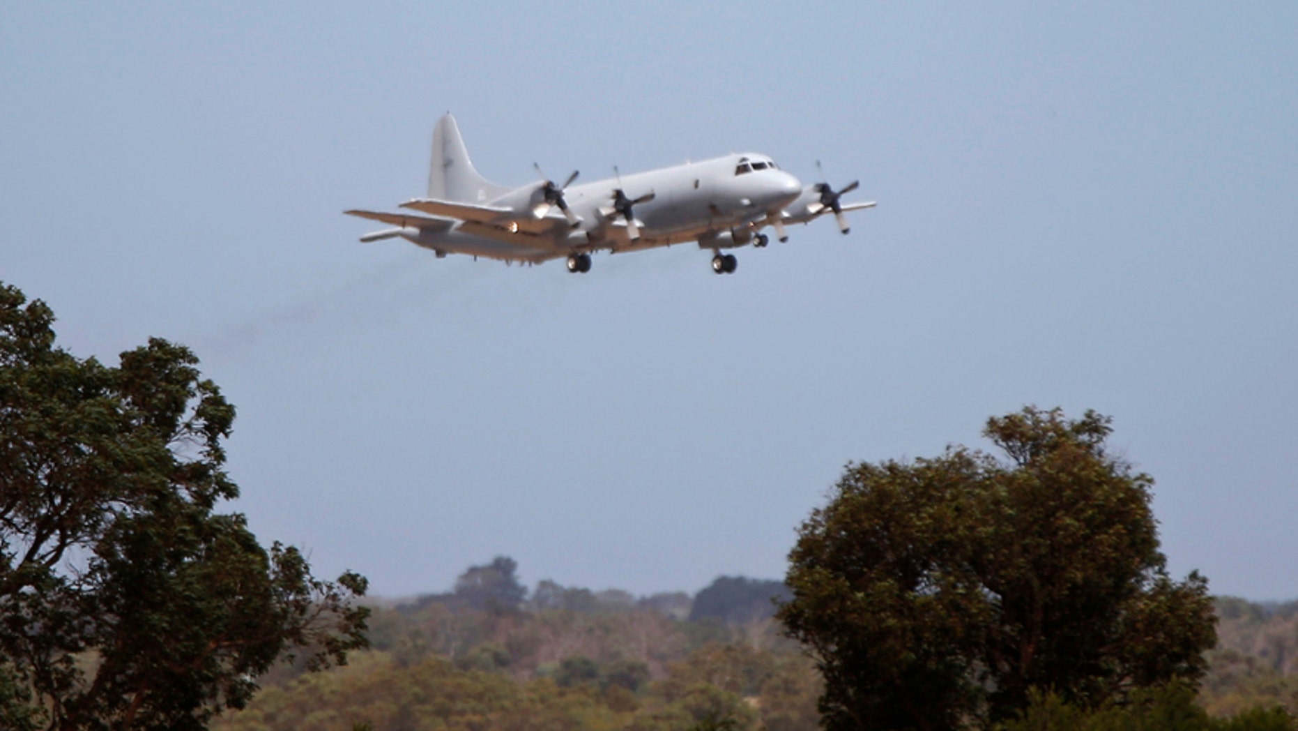 A Royal Australian Air Force P-3 Orion aircraft takes off from RAAF Base Pearce near Perth, to search for the missing Malaysia Airlines flight MH370 over the southern Indian Ocean, March 23, 2014.