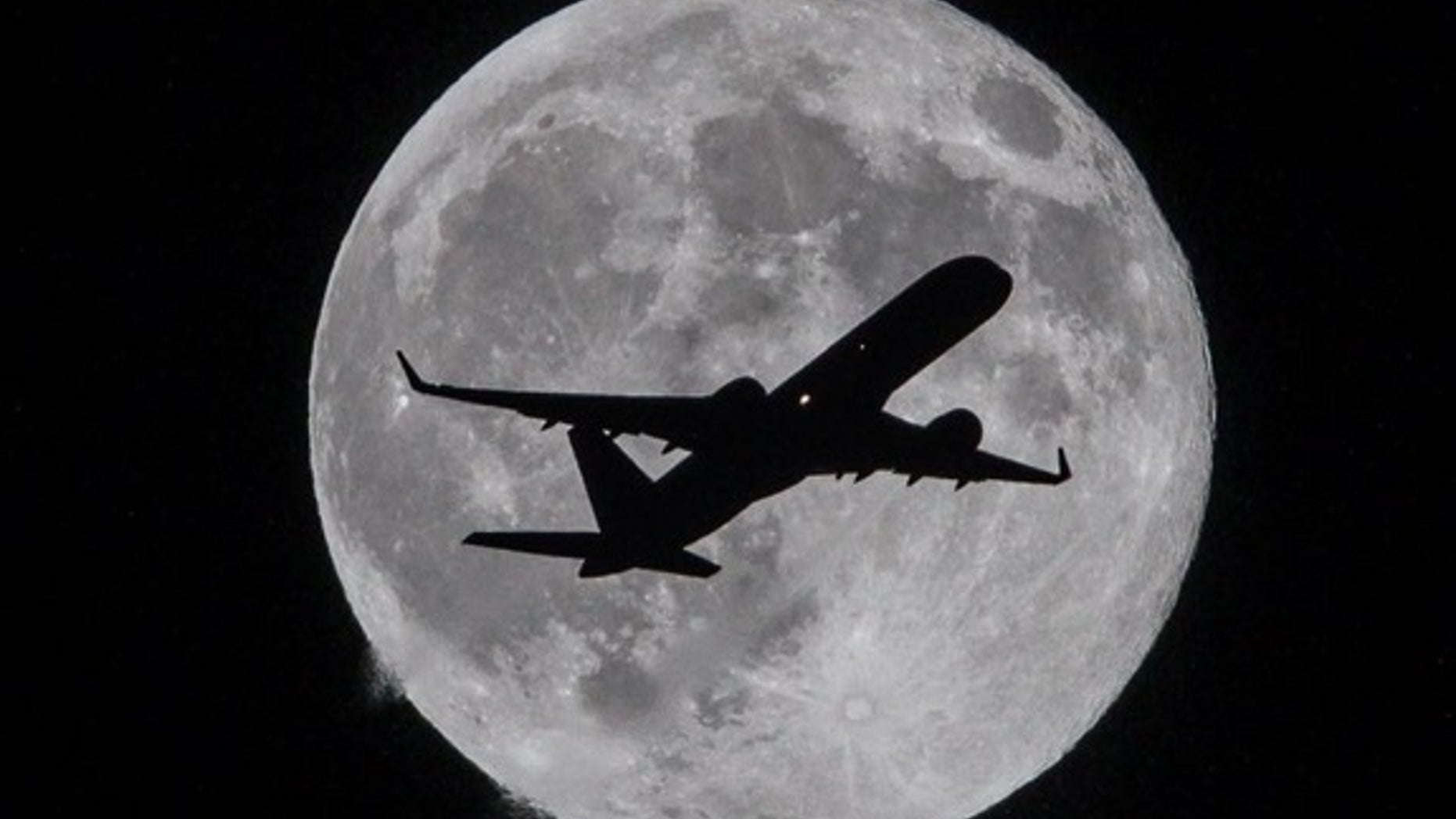 Living right on the flight path to Los Angeles International Airport delivers stunning night sky shots of the moon for astrophotographer <a href="www.facebook.com/TheLunartics"> Raul Roa </a>. Roa took the image in Whittier, Calif.