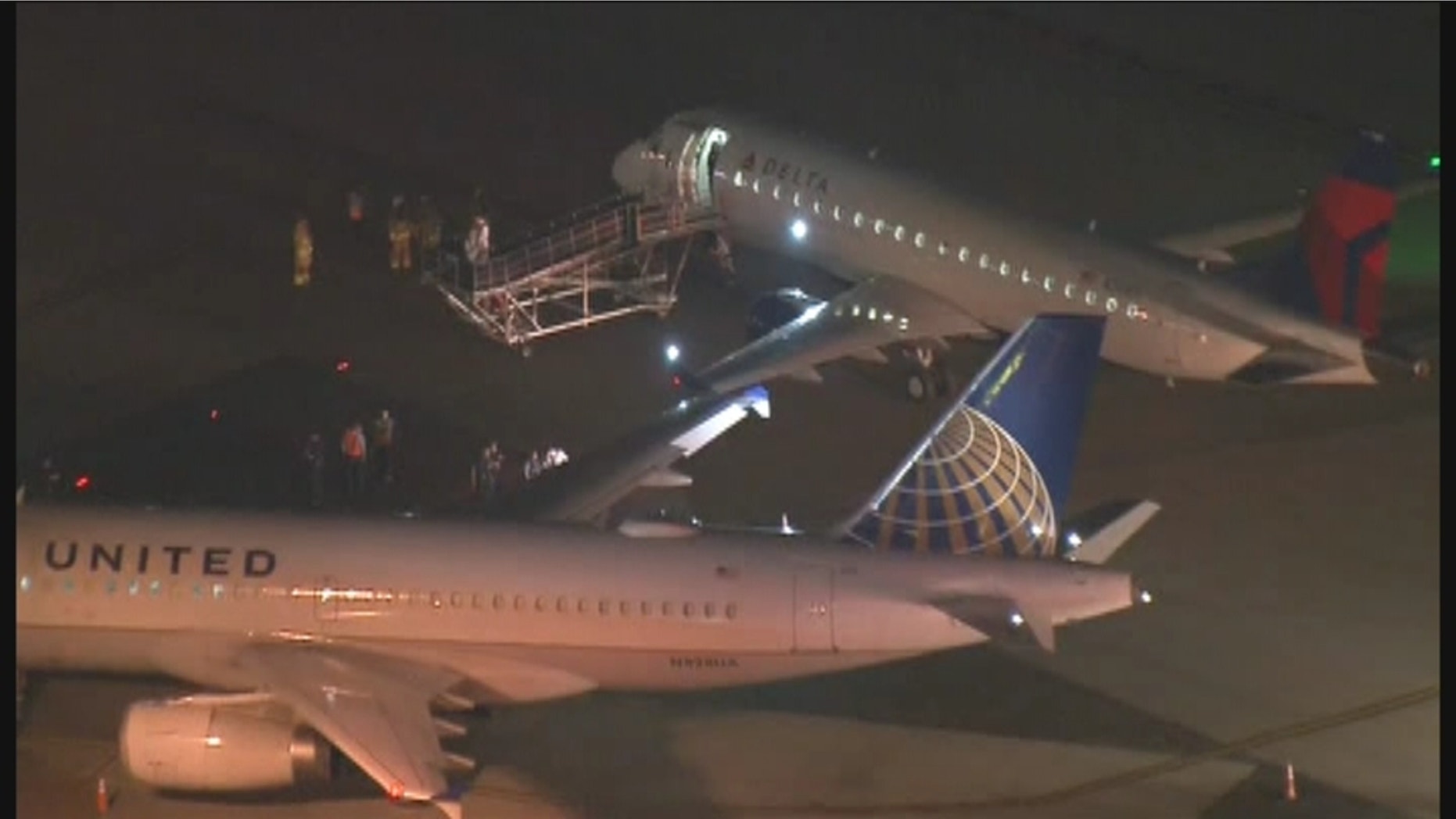 The Delta aircraft was taxiing to the gate when it struck the wing of the empty United plane.