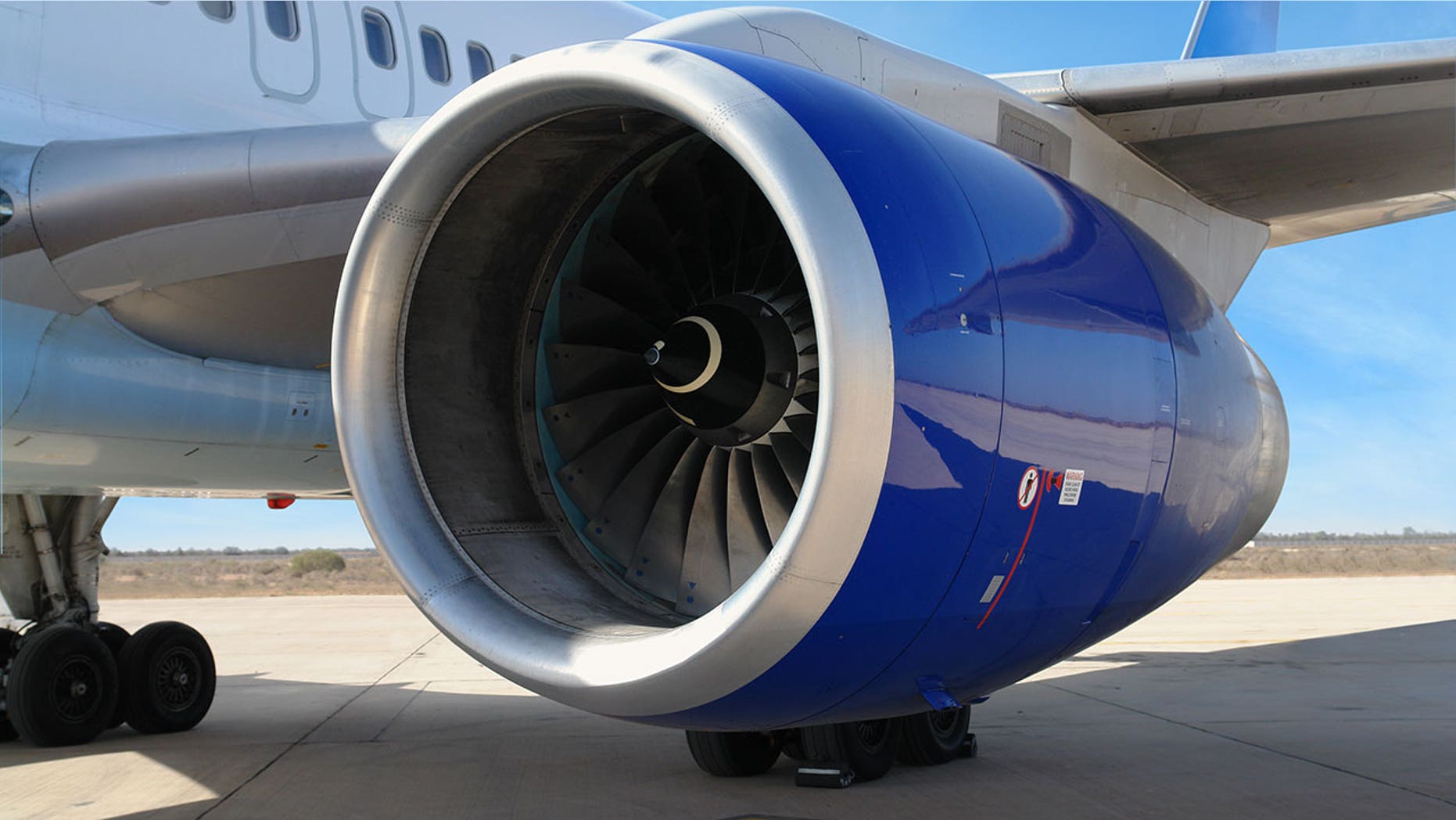 An 80-year-old Chinese passenger stopped on the tarmac to "bless" the plane with coins.