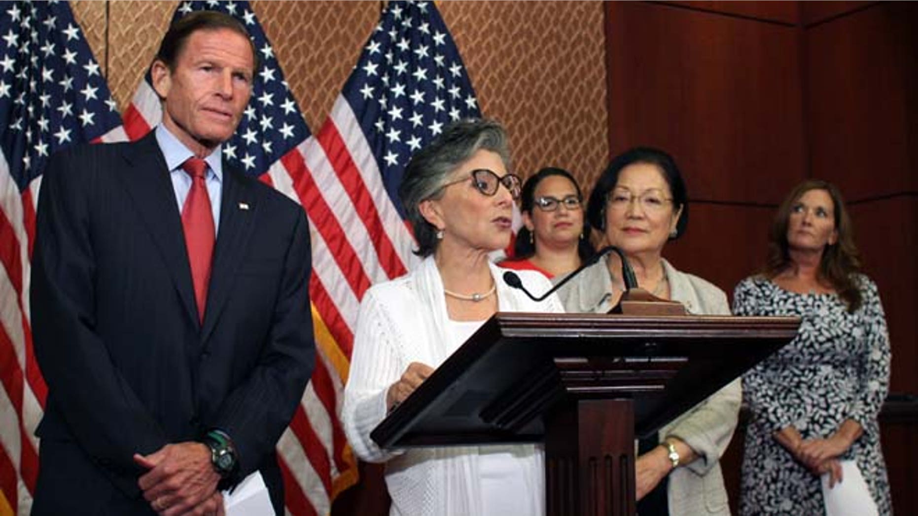 Aug. 3, 2015: Sen. Barbara Boxer, D-Calif., speaks to reporters in defense of Planned Parenthood as Sens. Richard Blumenthal, D-Conn., left, and Mazie Hirono, D-Hawaii, right, listen.