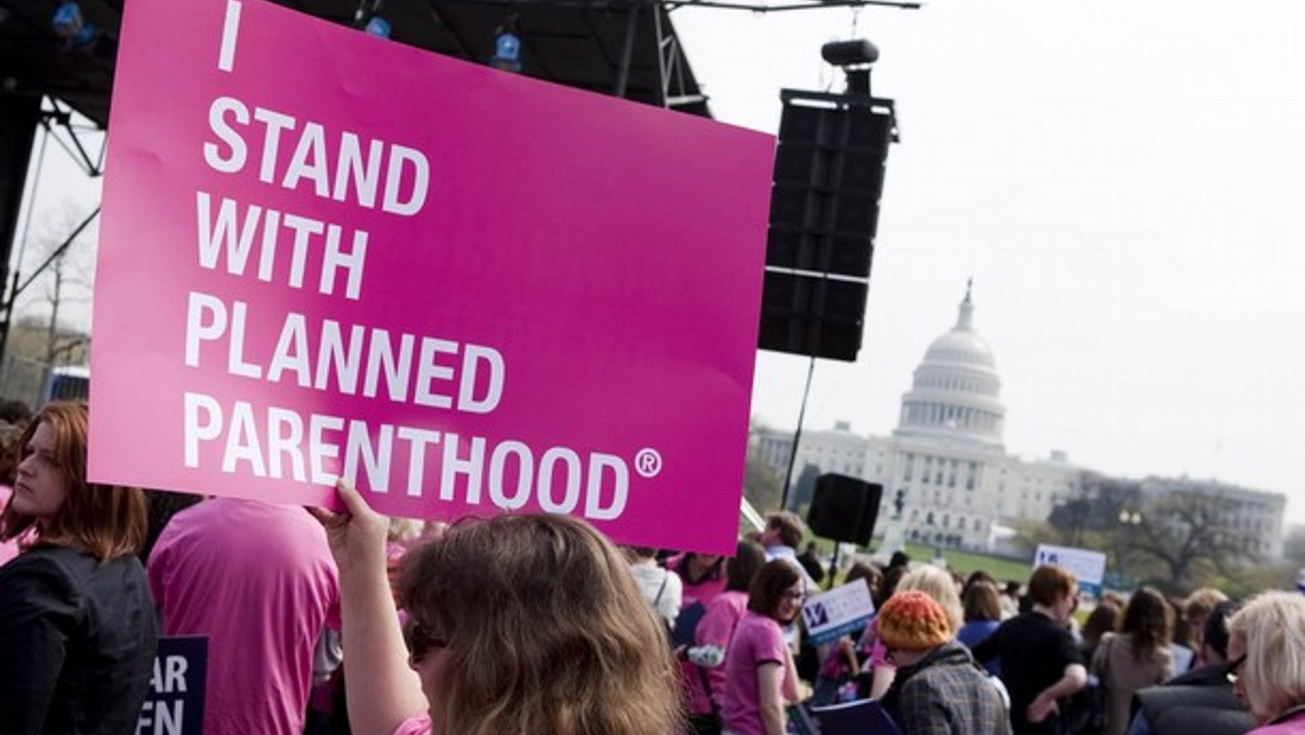 FILE: In this April 7, 2011, photo, members of Planned Parenthood, NARAL Pro-Choice America and more than 20 other organizations hold a "Stand Up for Women's Health" rally in support of preventive health care and family planning services, including abortion, in Washington.