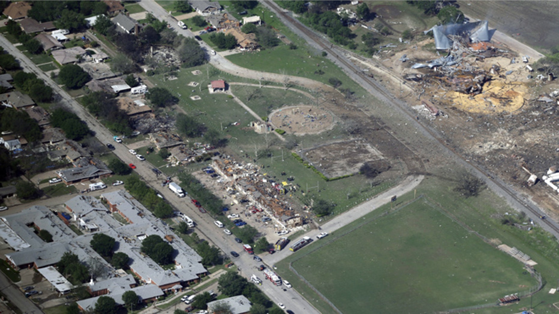 April 18, 2013: The remains of a nursing home, left, apartment complex, center, and fertilizer plant, right, that were destroyed by an explosion in West, Texas are seen in this aerial photo.