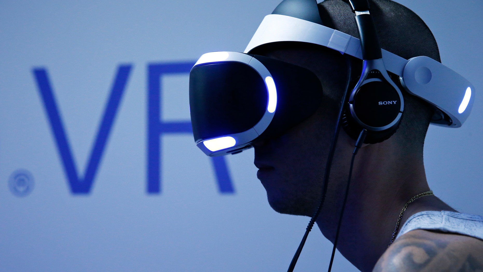File photo - A visitor plays a game on a PlayStation VR at the Paris Games Week, a trade fair for video games in Paris, France, Oct. 28, 2015. (REUTERS/Benoit Tessier)