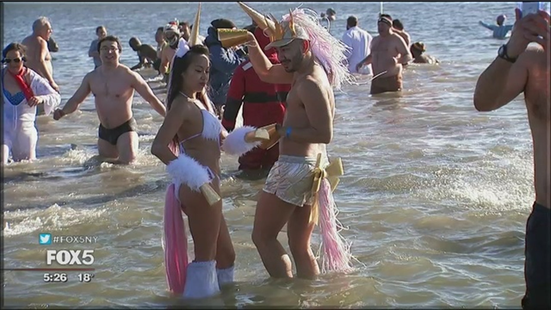 Frigid temperatures did not faze the Coney Island Polar Bear Club, who braved the sub-zero wind chills to sprint into the ocean New Year’s Day.