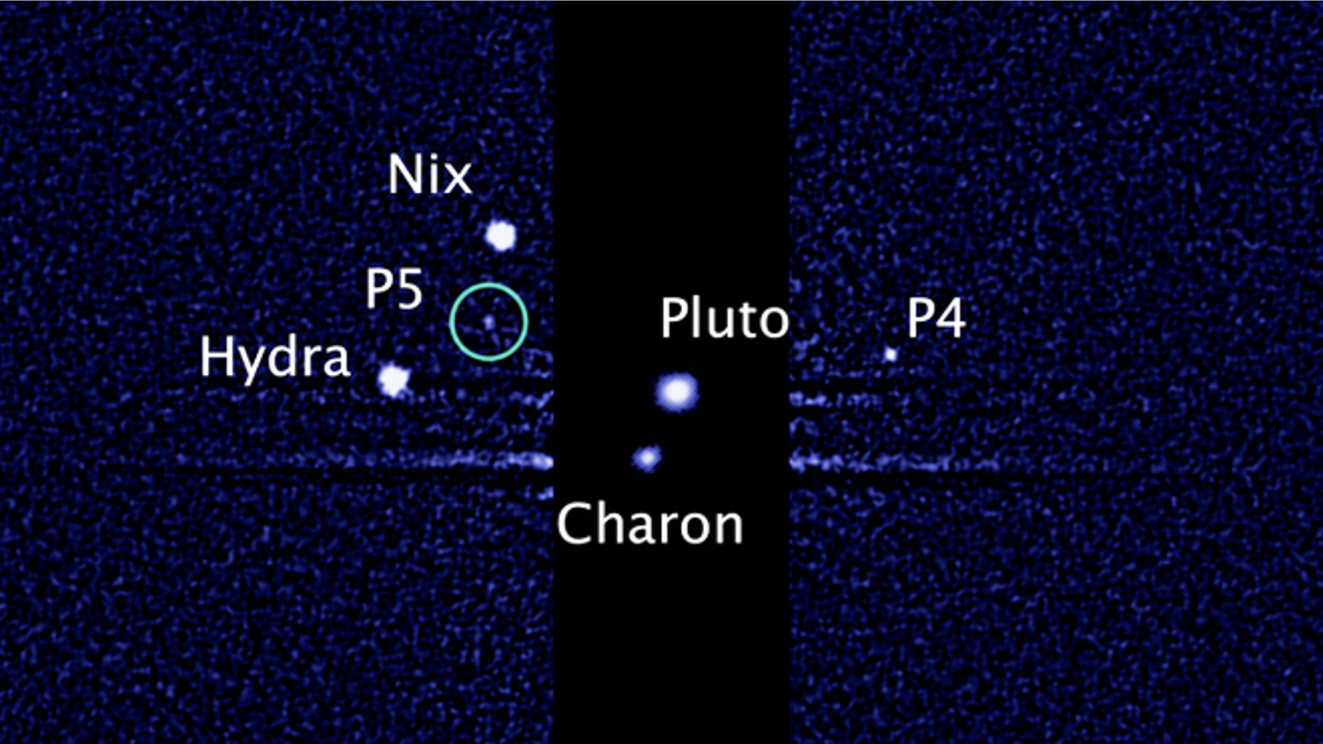This image, taken by NASA's Hubble Space Telescope, shows five moons orbiting the distant, icy dwarf planet Pluto. The green circle marks the newly discovered moon, designated P5, as photographed by Hubble's Wide Field Camera 3 on July 7, 2012.