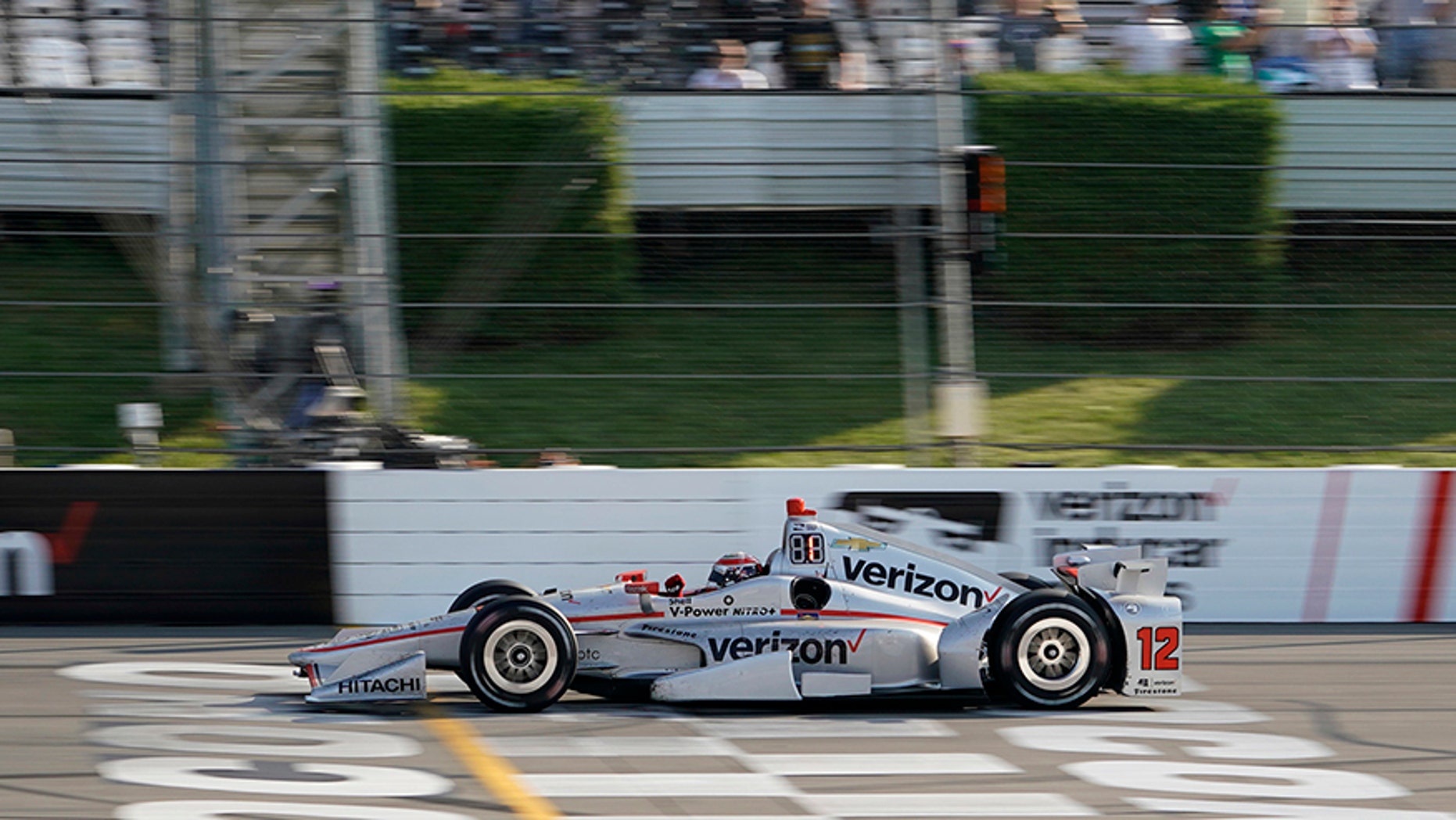 Will Power crosses the finish line to win the IndyCar auto race at Pocono Raceway, Sunday, Aug. 20, 2017, in Long Pond, Pa. (AP Photo/Matt Slocum)