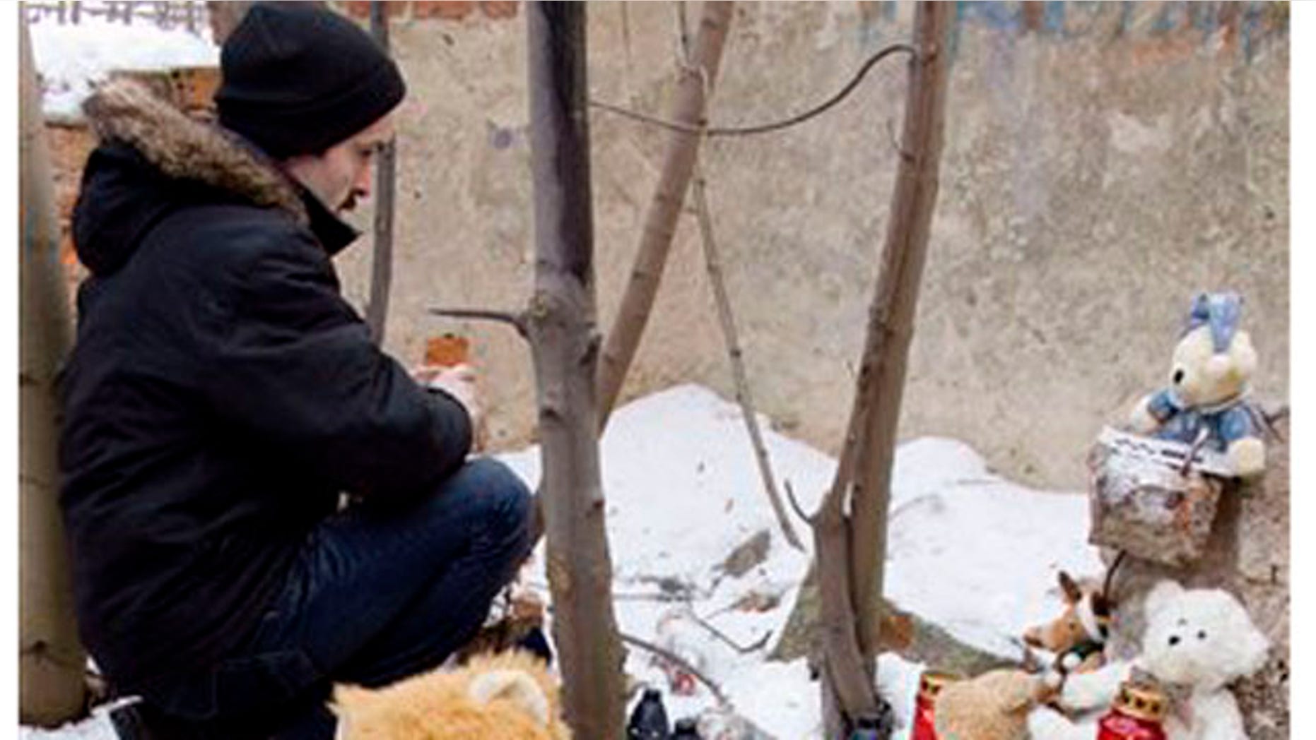Feb. 5 2012: Toys, candles and flowers are left at a park where a mother buried her child and then sparked a nationwide search by falsely claiming she had been kidnapped, in Sosnowiec, southern Poland.