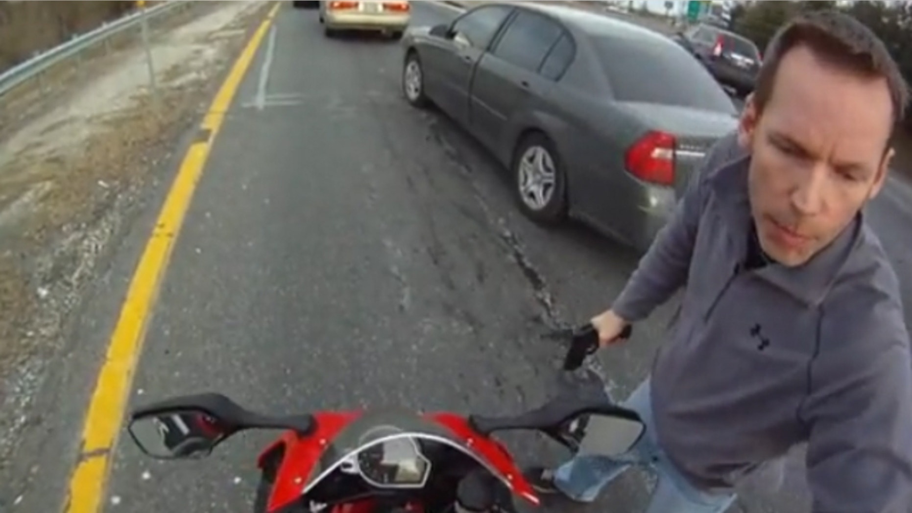Motorcyclist Anthony Graber drew national attention when he posted a video in March showing plainclothes Maryland State Trooper Joseph D. Uhler with his gun drawn pulling him over on a speeding and reckless driving violation. (YouTube)