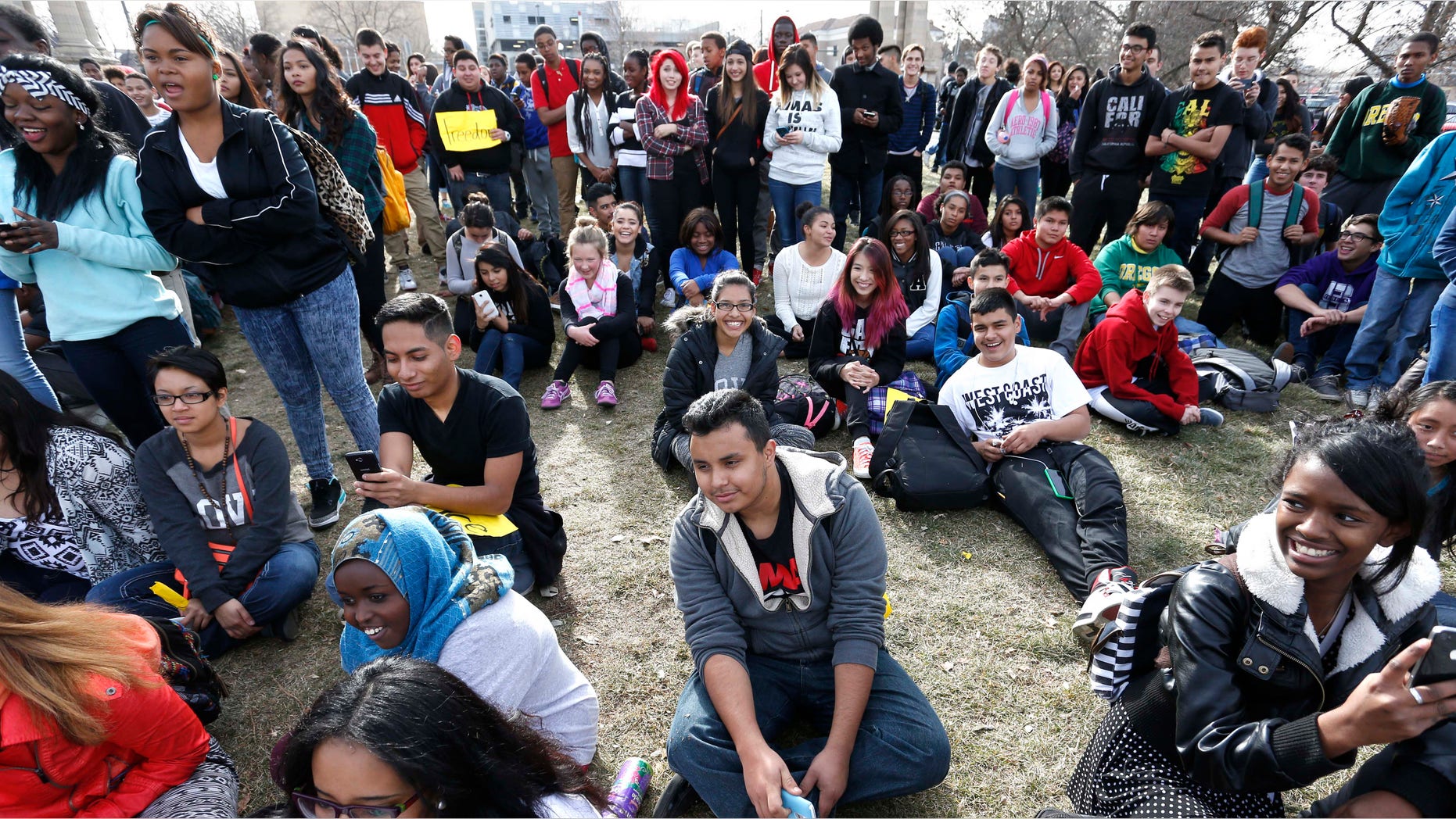 Dec. 8, 2014: South High students and supporters participate in a protest against recent grand jury decisions not to indict police officers in the killings of unarmed men, in front of East High, in Denver