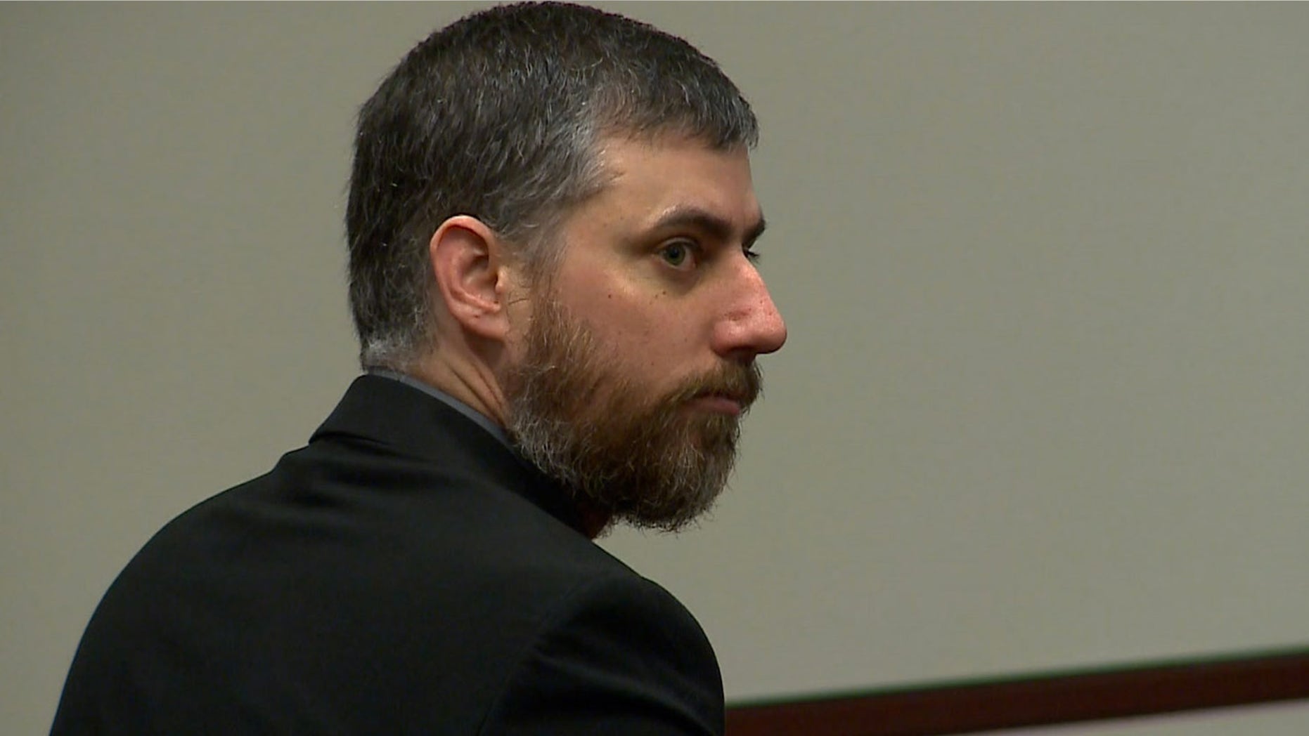 In an undated image from video, former Portsmouth, Va. police officer Stephen Rankin sits in court in Portsmouth, Va.