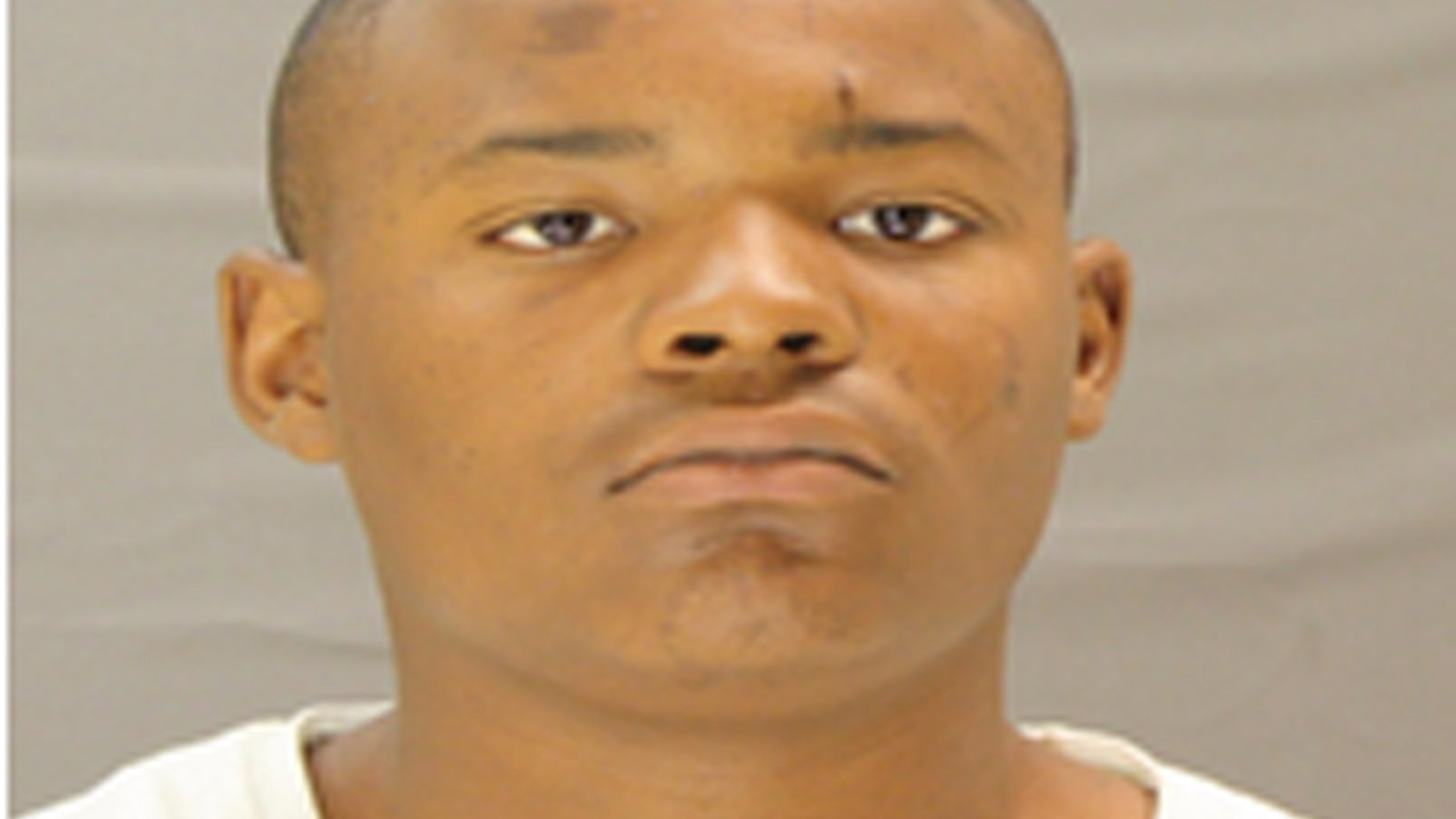 Keithan Kennard Manuel allegedly walked into a police station and told the dispatcher to hand over the station's money.