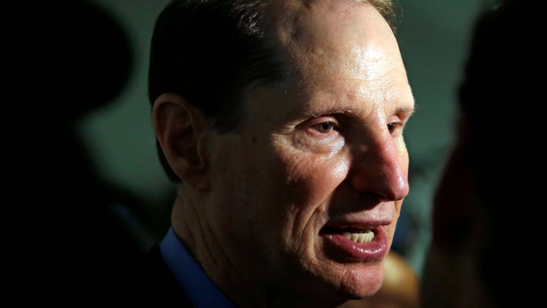 In this Sept. 25, 2015, file photo, U.S. Sen. Ron Wyden, D-Ore., speaks after a news conference in Portland, Ore. A frequent critic of the pharmaceutical industry, despite receiving more than $40,000 from opioid drugmakers to his campaigns and his leadership PAC in the past decade, Wyden proposed eliminating the exemption and using the $75 million to fund addiction treatment for low-income pregnant women, who must forfeit their Medicaid prenatal coverage before seeking treatment.