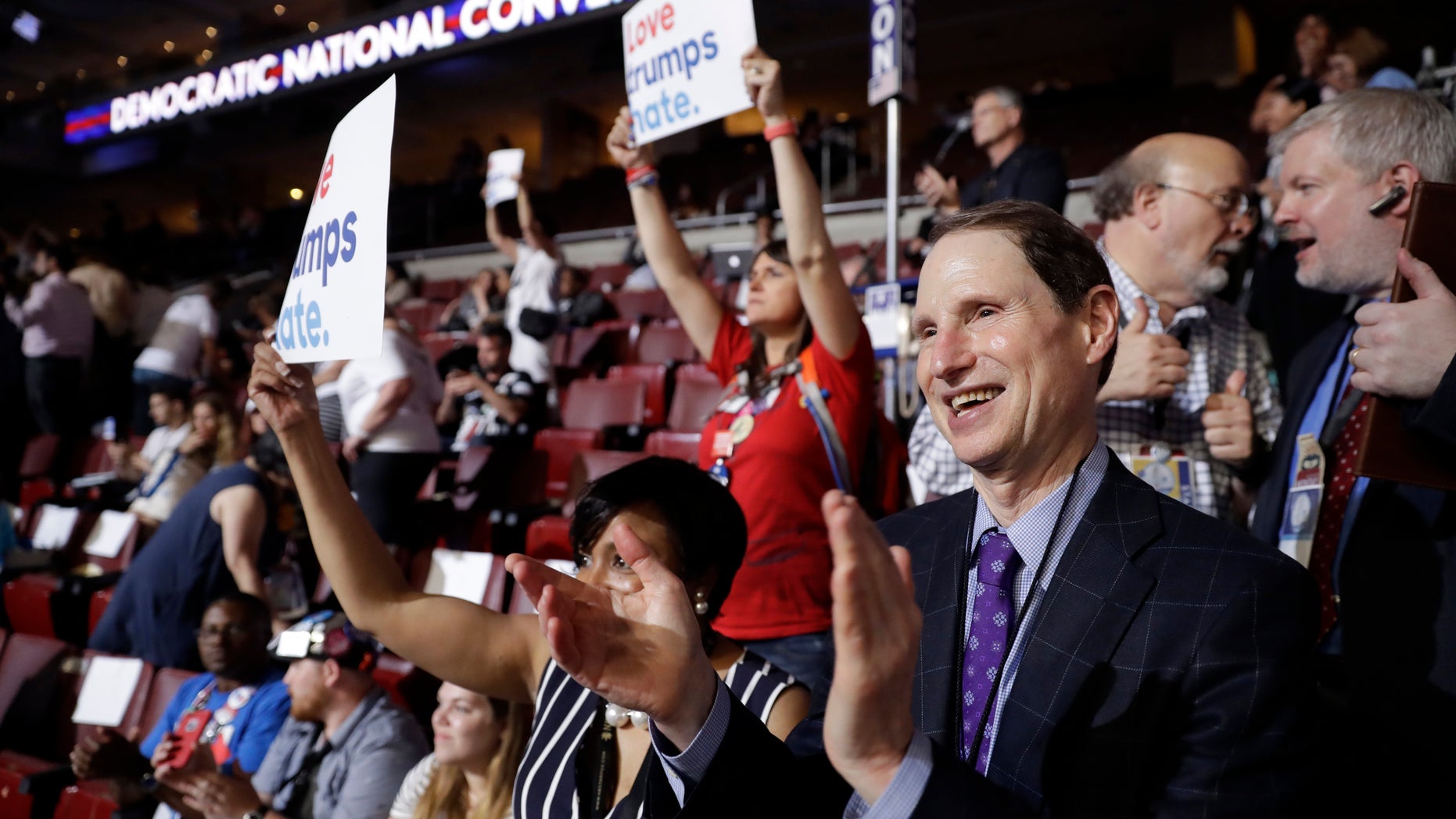 In this July 25, 2016, file photo, Sen. Ron Wyden, D-Ore., applauds during the first day of the Democratic National Convention in Philadelphia. Penn. A frequent critic of the pharmaceutical industry, despite receiving more than $40,000 from opioid drugmakers to his campaigns and his leadership PAC in the past decade, Wyden proposed eliminating the exemption and using the $75 million to fund addiction treatment for low-income pregnant women, who must forfeit their Medicaid prenatal coverage before seeking treatment.