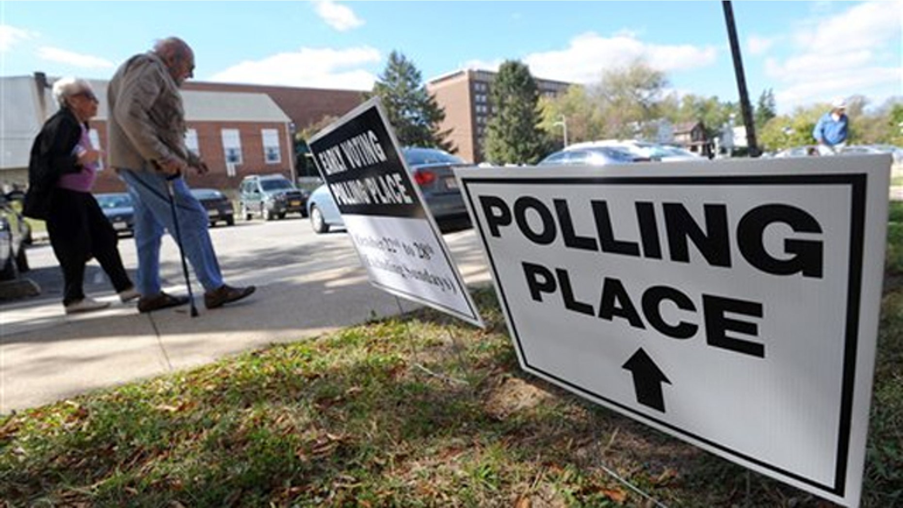 Voters arrive to cast early ballots in Maryland's general election Oct. 22 in Baltimore. (AP Photo)