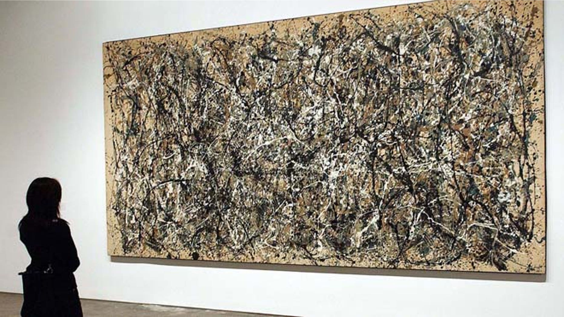 FILE 2002: Jackson Pollock's painting "One"; is on display at the grand opening of the Museum of Modern Art (MoMA) in Queens, New York.