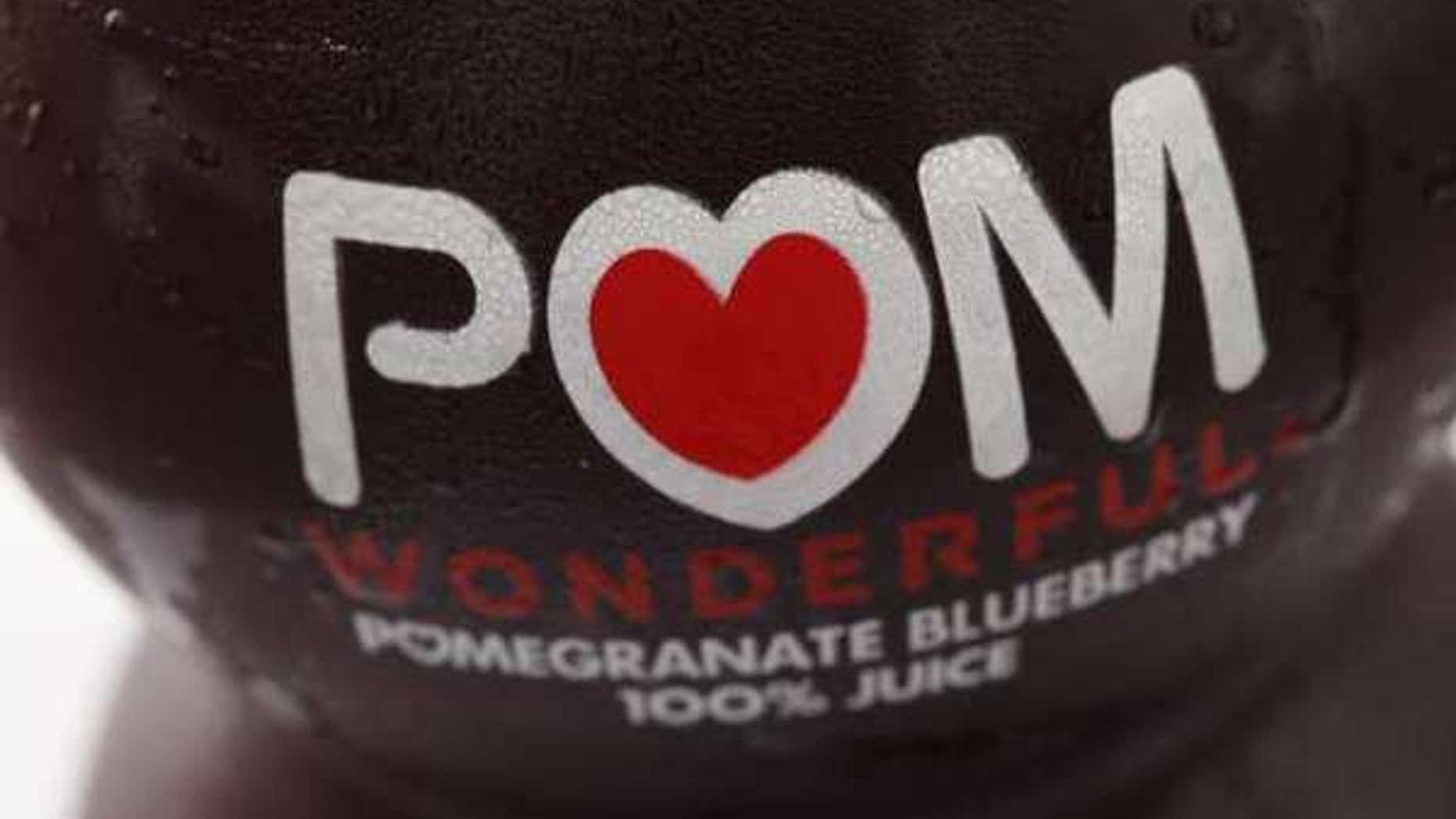 Displayed is a bottle of POM Wonderful juice in Philadelphia, Monday, Sept. 27, 2010. Regulators filed complaints against the makers of POM Wonderful Pomegranate Juice and other products on Monday, saying there's no science to support the company's claims that its products treat or prevent diseases such as prostate cancer and erectile dysfunction. (AP Photo/Matt Rourke)