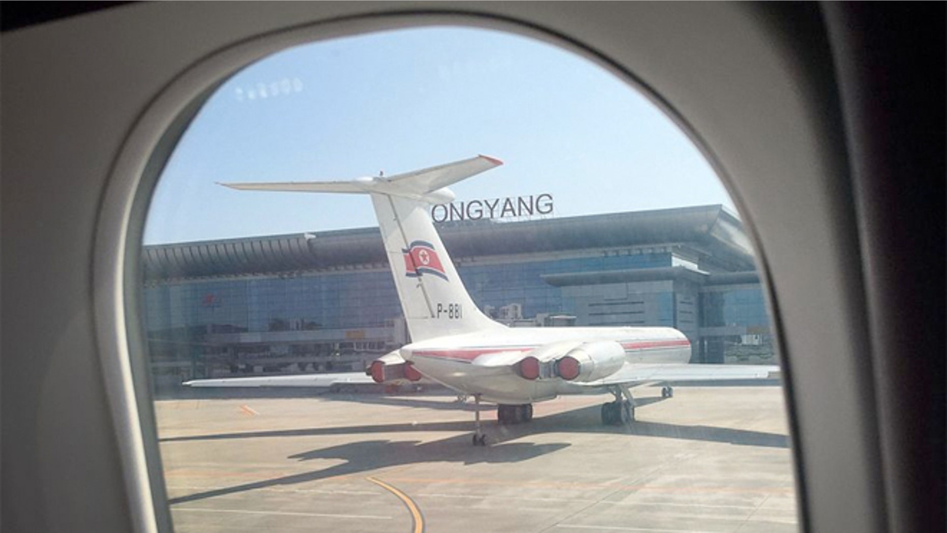 An Air Koryo plane sits on the tarmac in front of the new Pyongyang International Airport terminal building, in Pyongyang, North Korea.