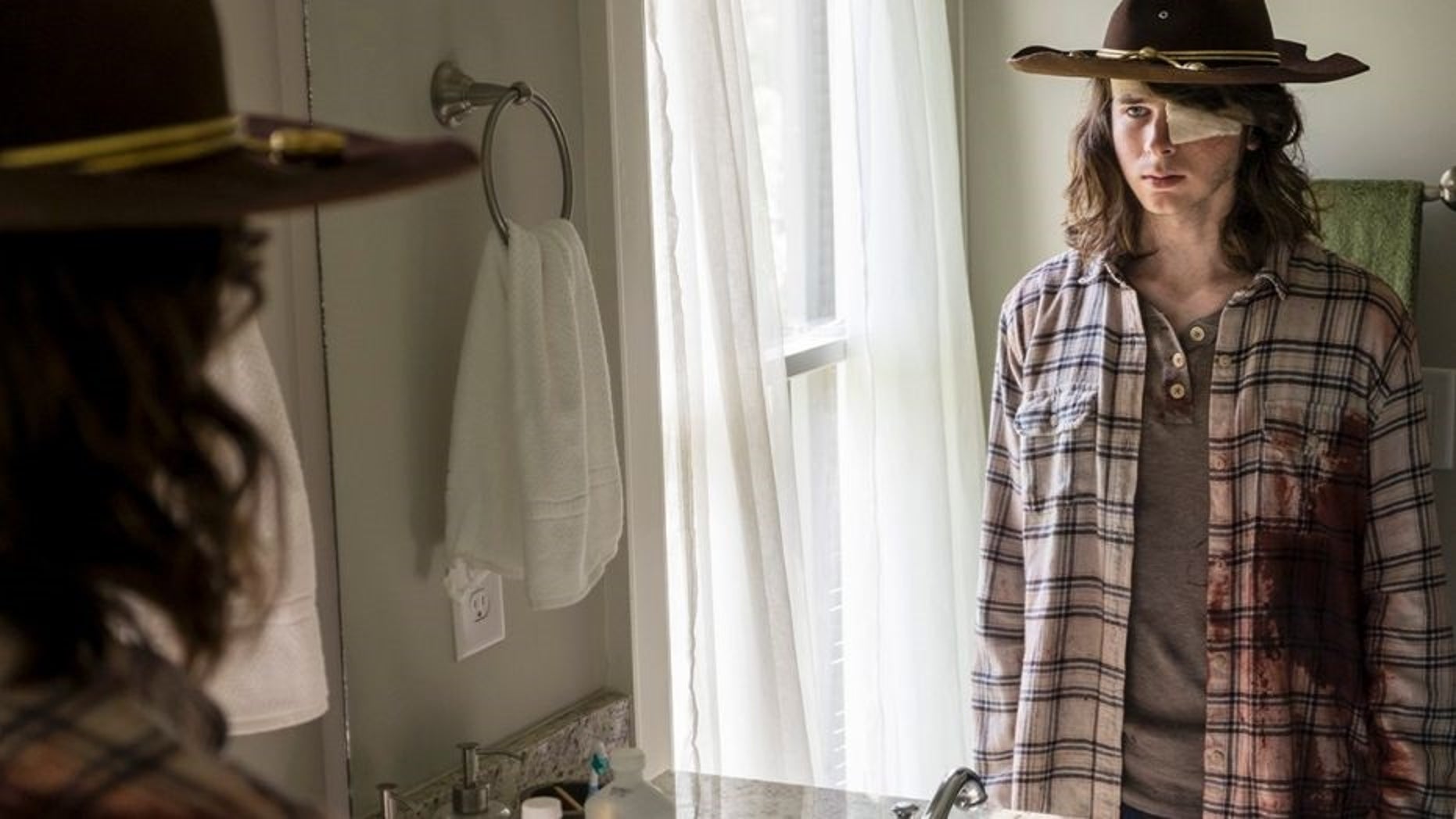 “The Walking Dead” suffered its lowest ratings Sunday during its midseason premiere.